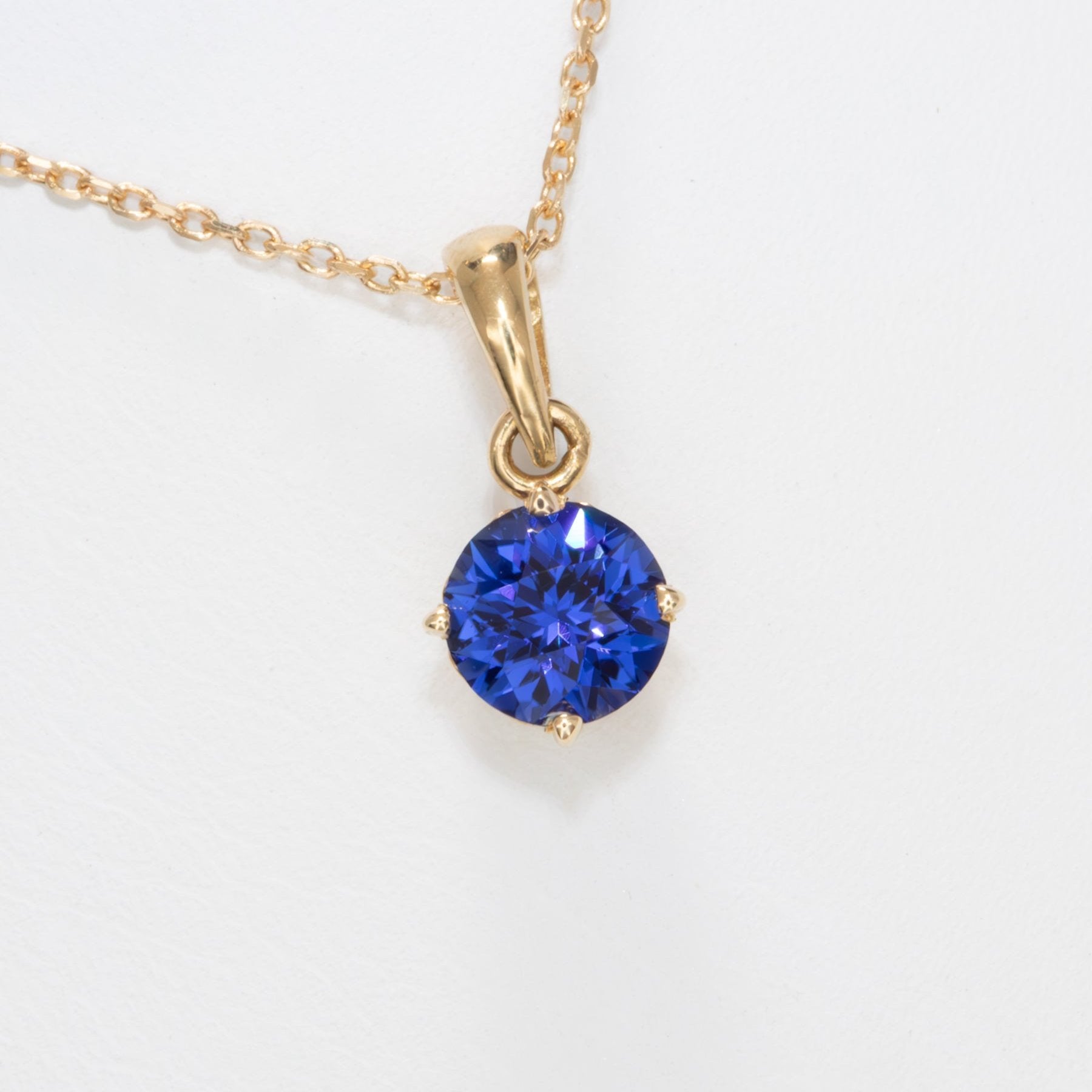 royal blue lab sapphire and yellow gold necklace