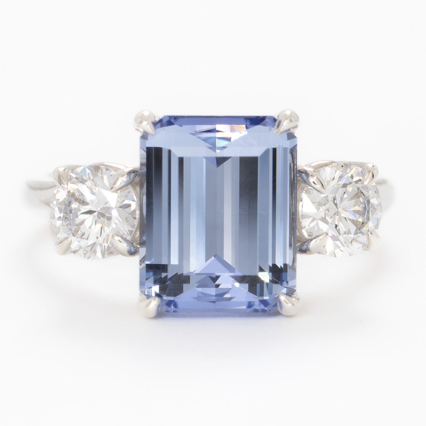 rylee three stone engagement ring with light blue lab sapphire step cut