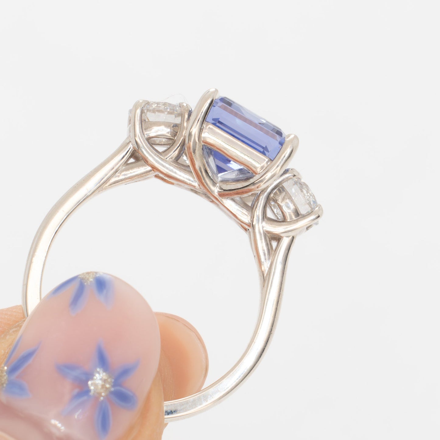 rylee three stone engagement ring with light blue lab sapphire step cut