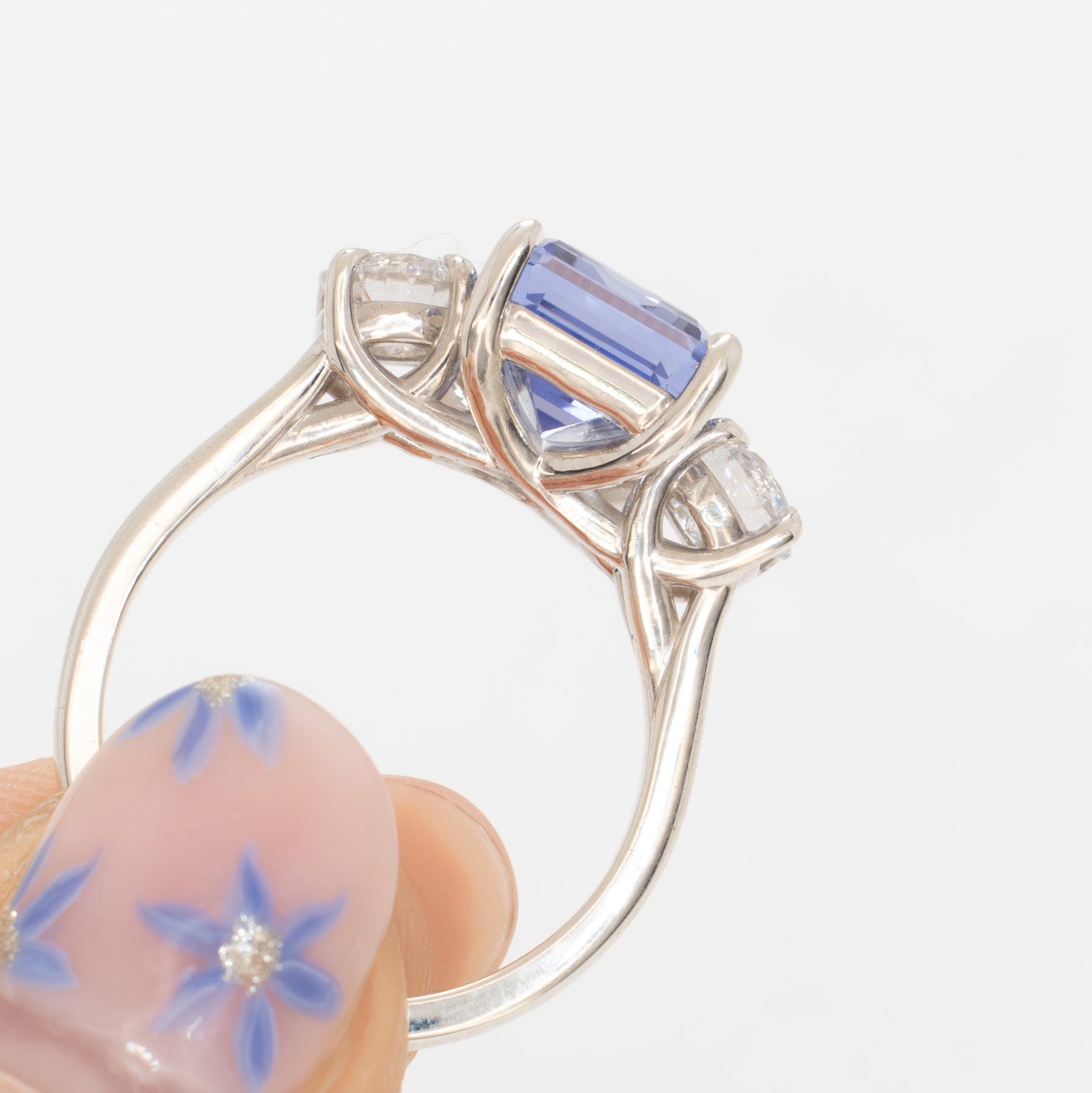 rylee three stone engagement ring with light blue lab sapphire step cut