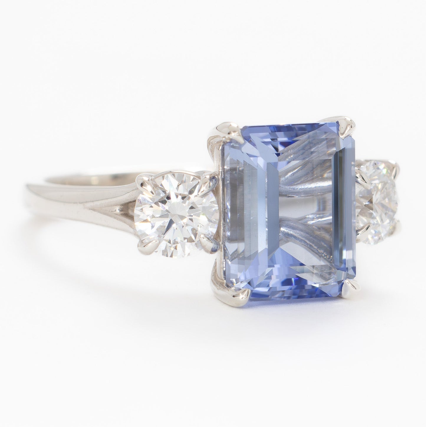 rylee three stone engagement ring with light blue lab sapphire step cut
