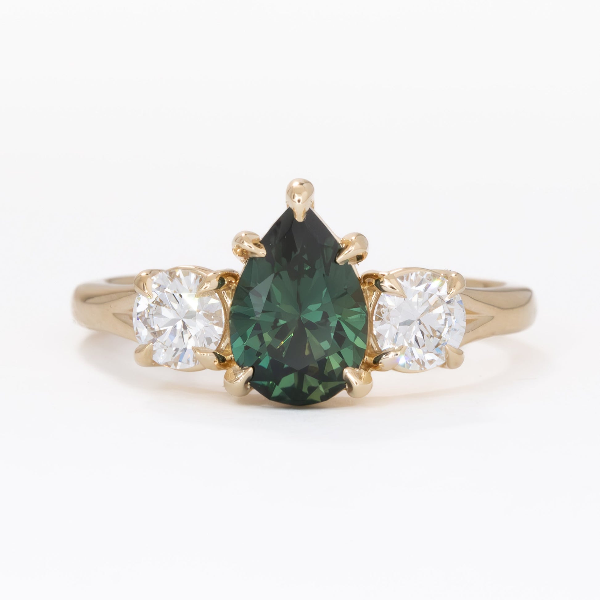 rylee three stone engagement ring with pear green lab sapphire