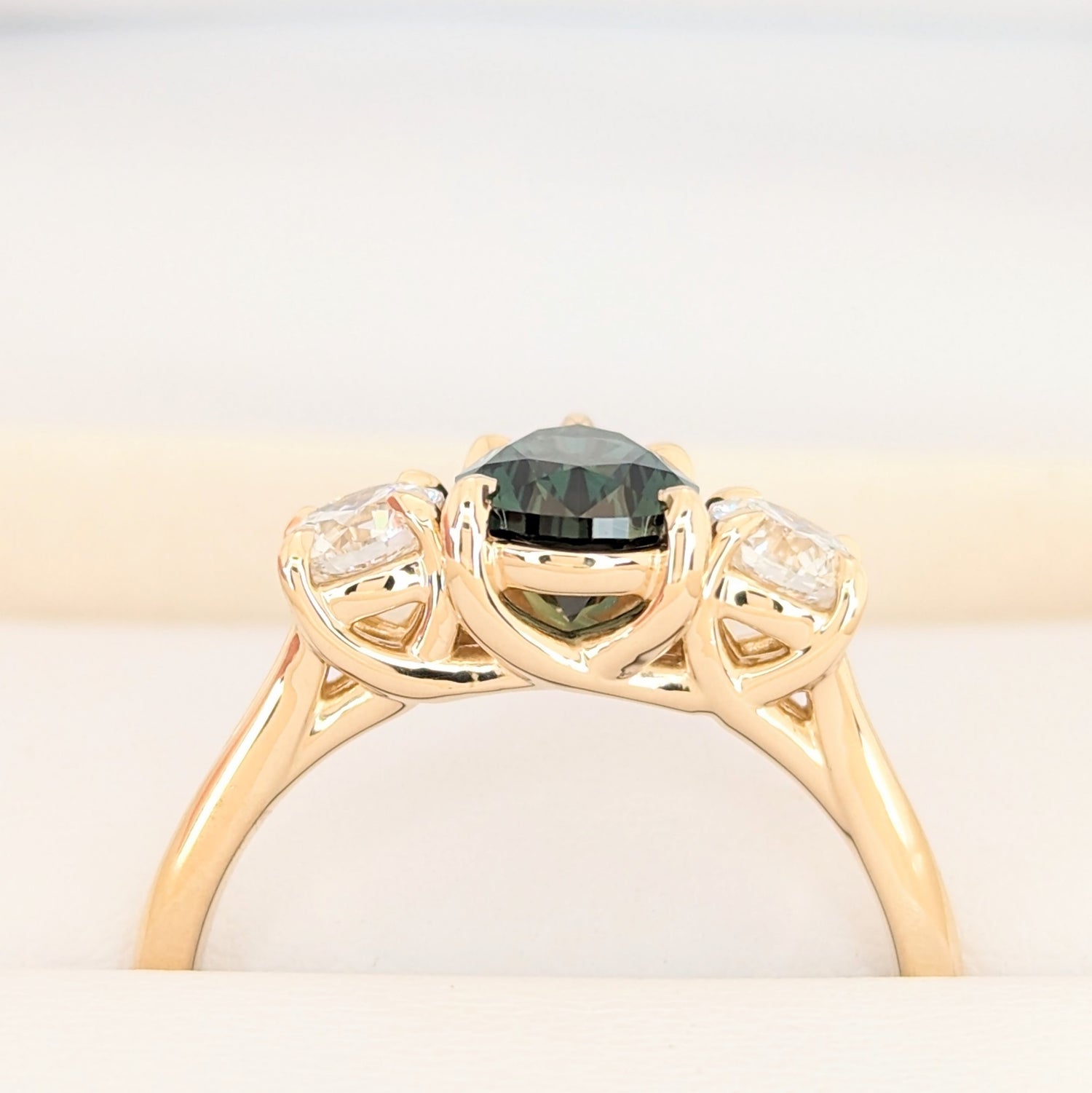 rylee three stone engagement ring with pear green lab sapphire