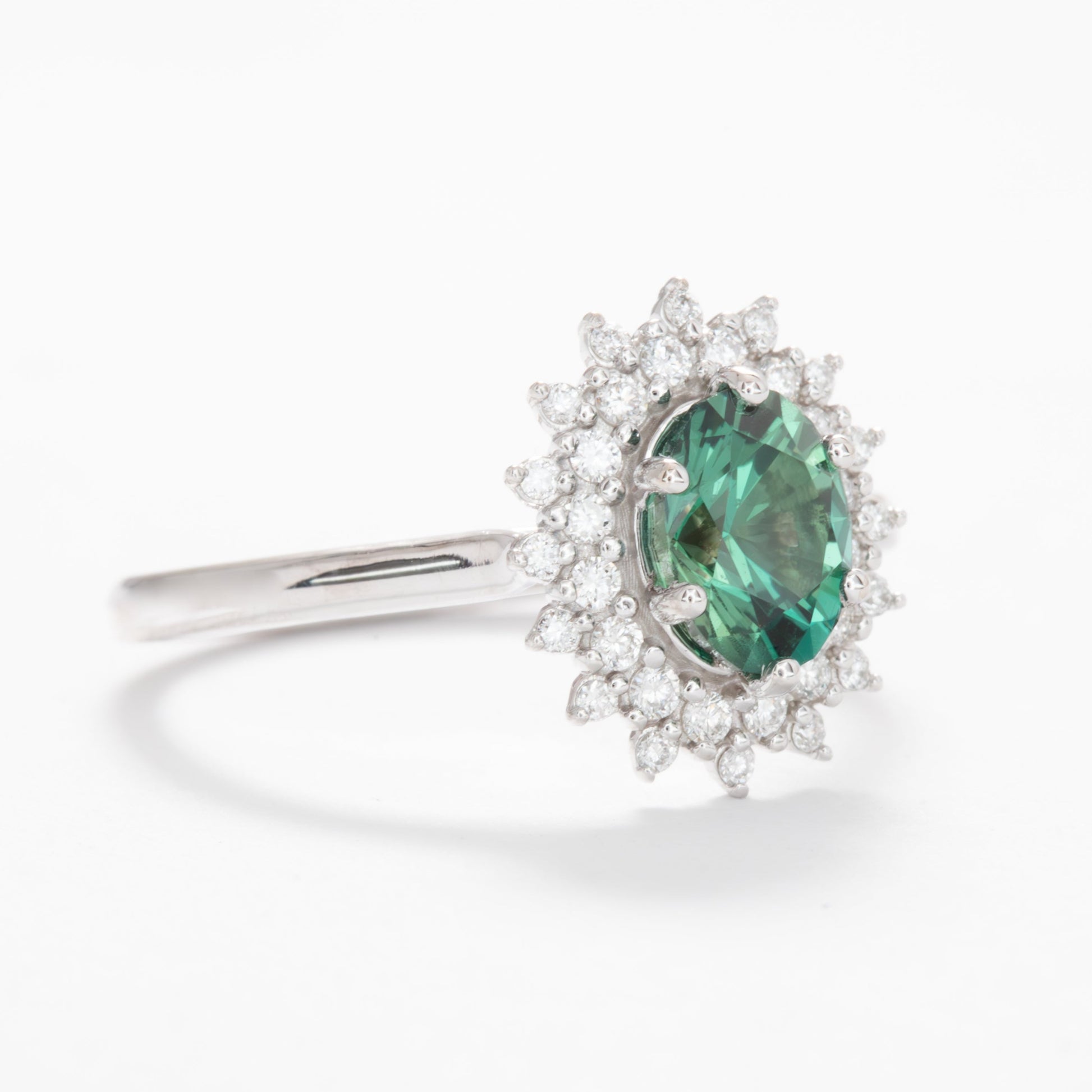 sabela double halo engagement ring with oval green lab sapphire