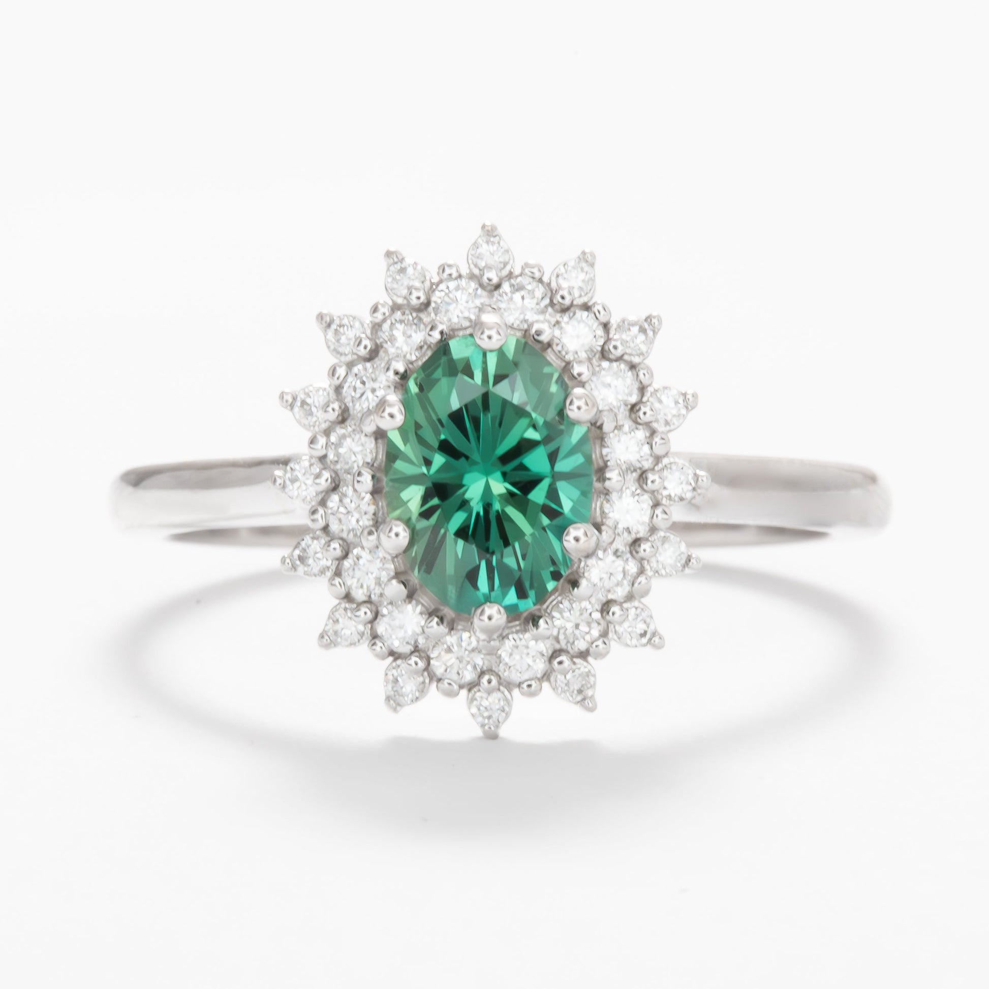 sabela double halo engagement ring with oval green lab sapphire