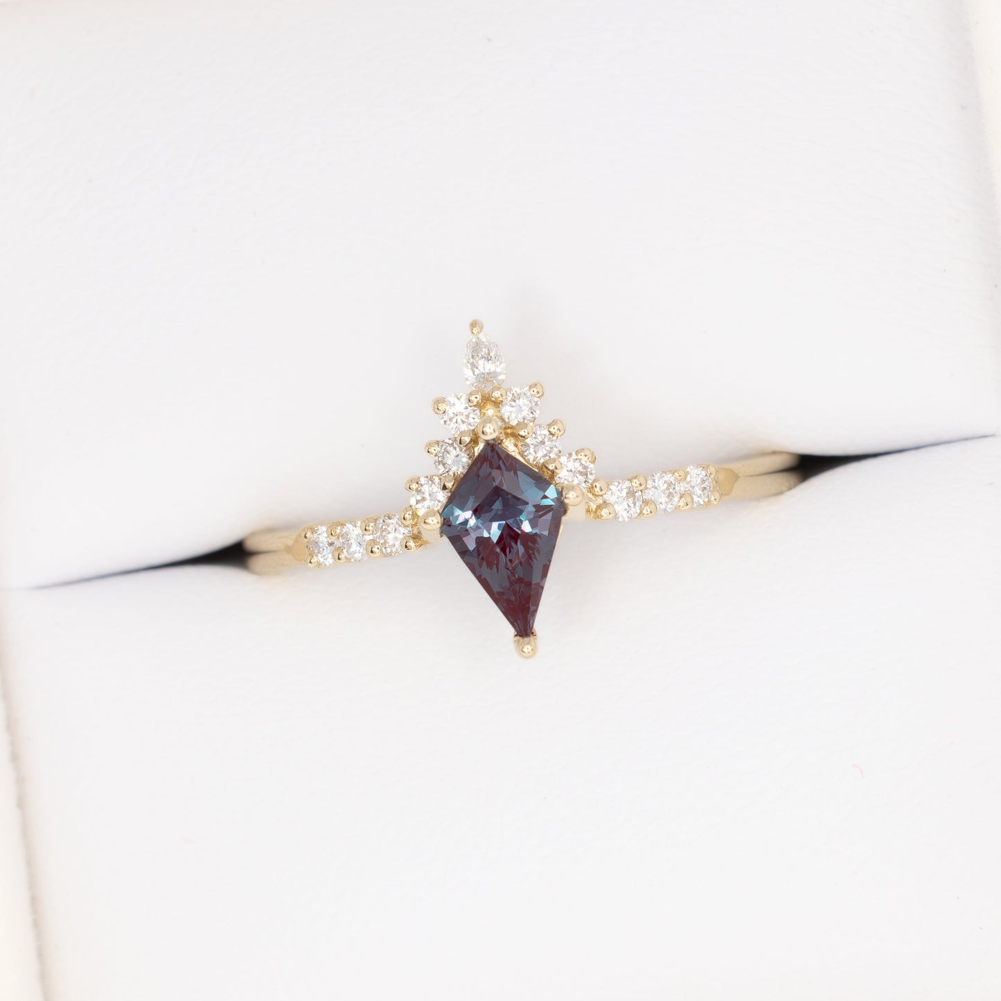 sadie half halo engagement ring in yellow gold with kite cut lab alexandrite
