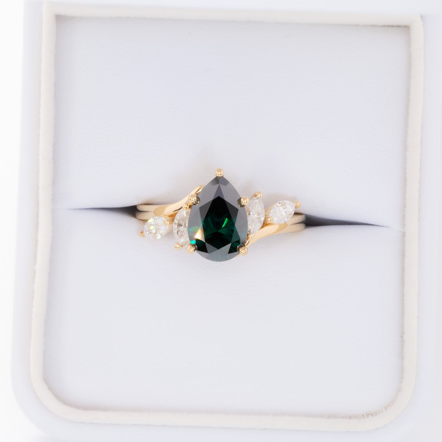 saige bypass ring with green moissanite pear