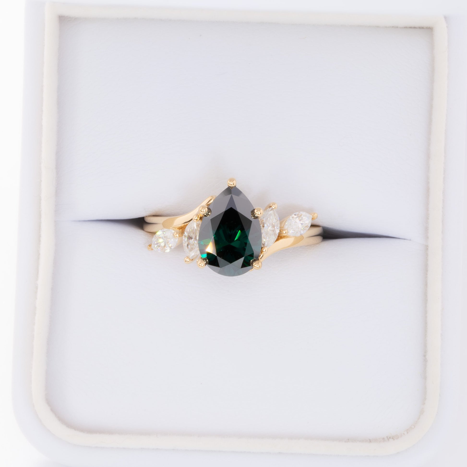 saige bypass ring with green moissanite pear