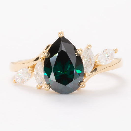 saige bypass ring with green moissanite pear