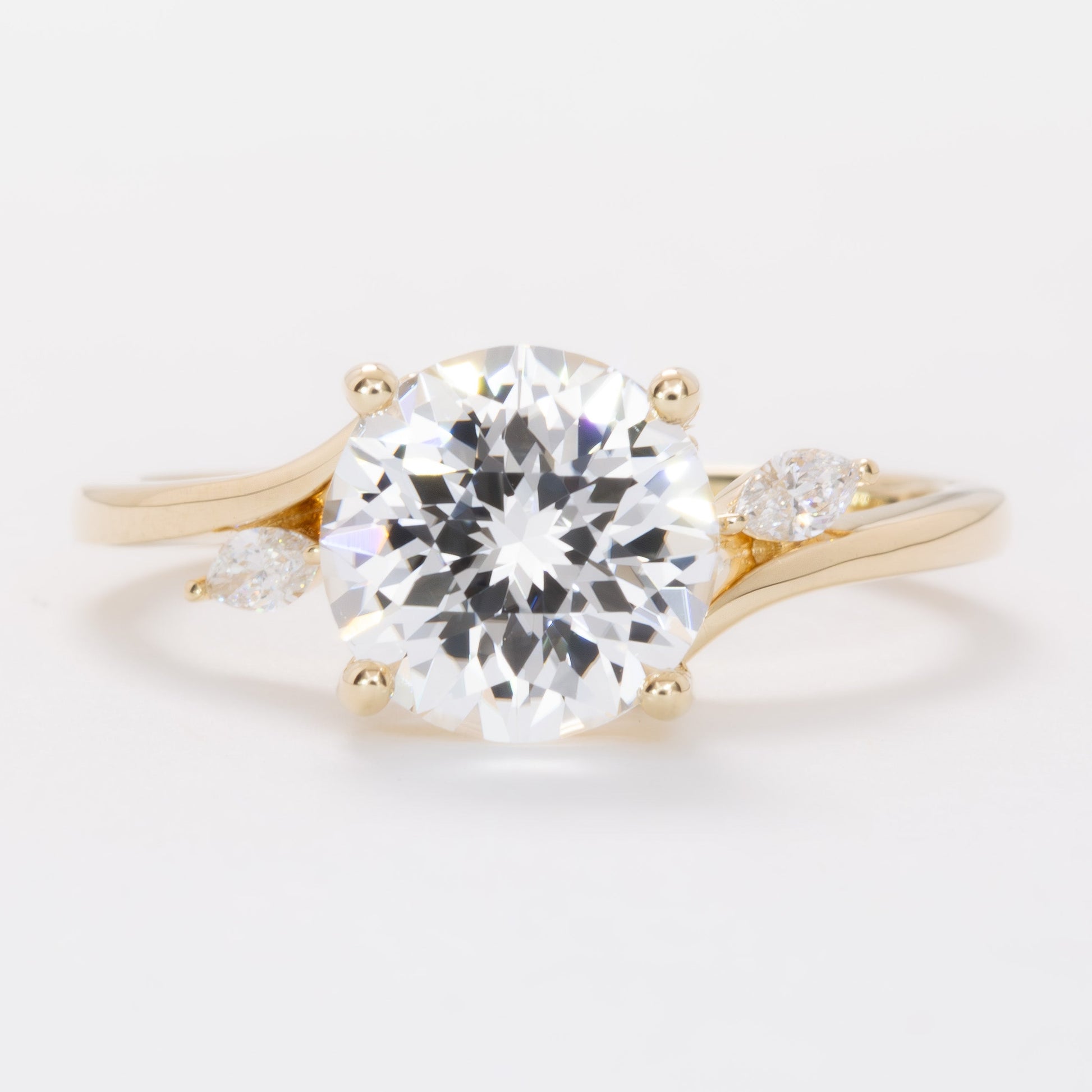saige bypass ring with round white lab sapphire
