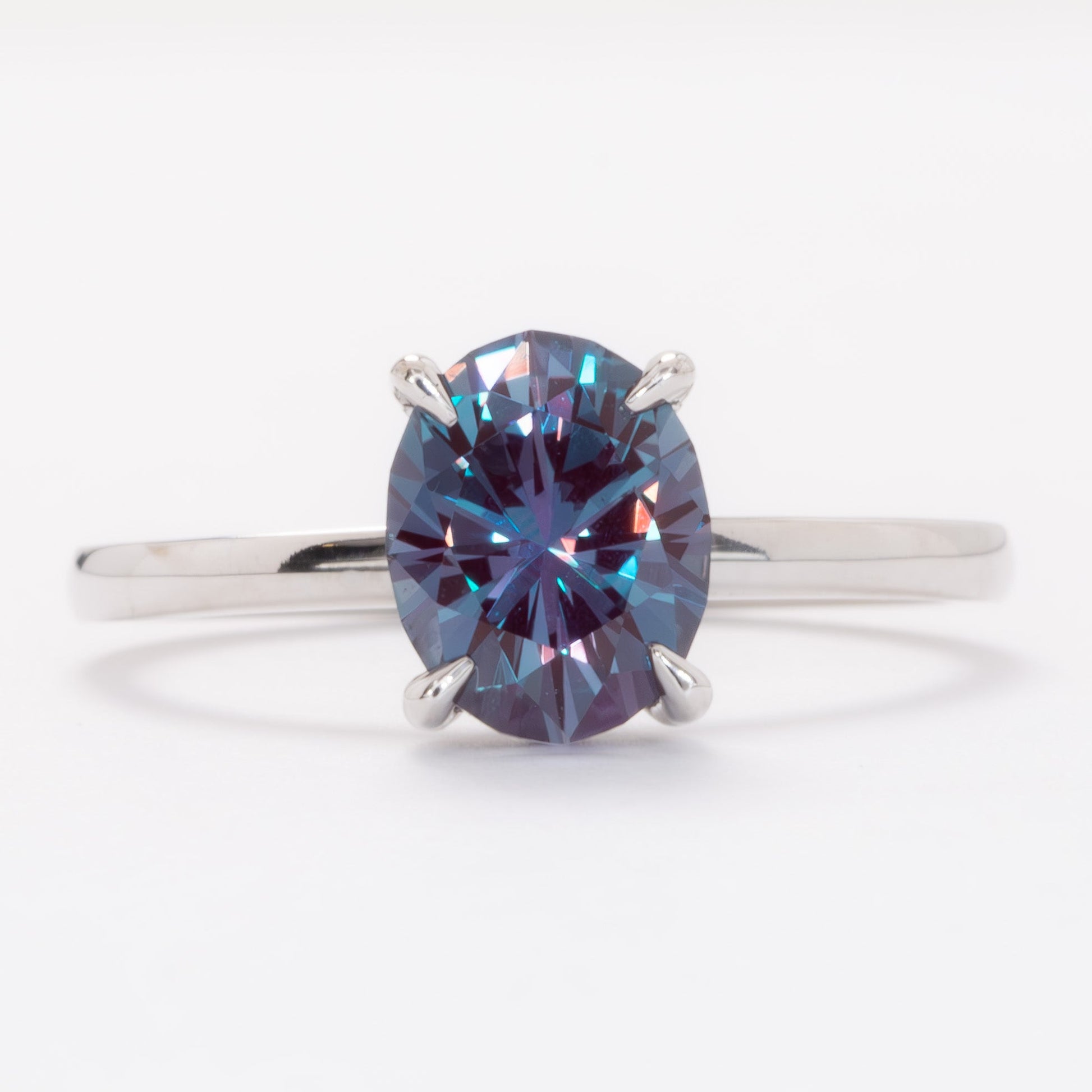 serene solitaire ring in white gold with oval lab alexandrite