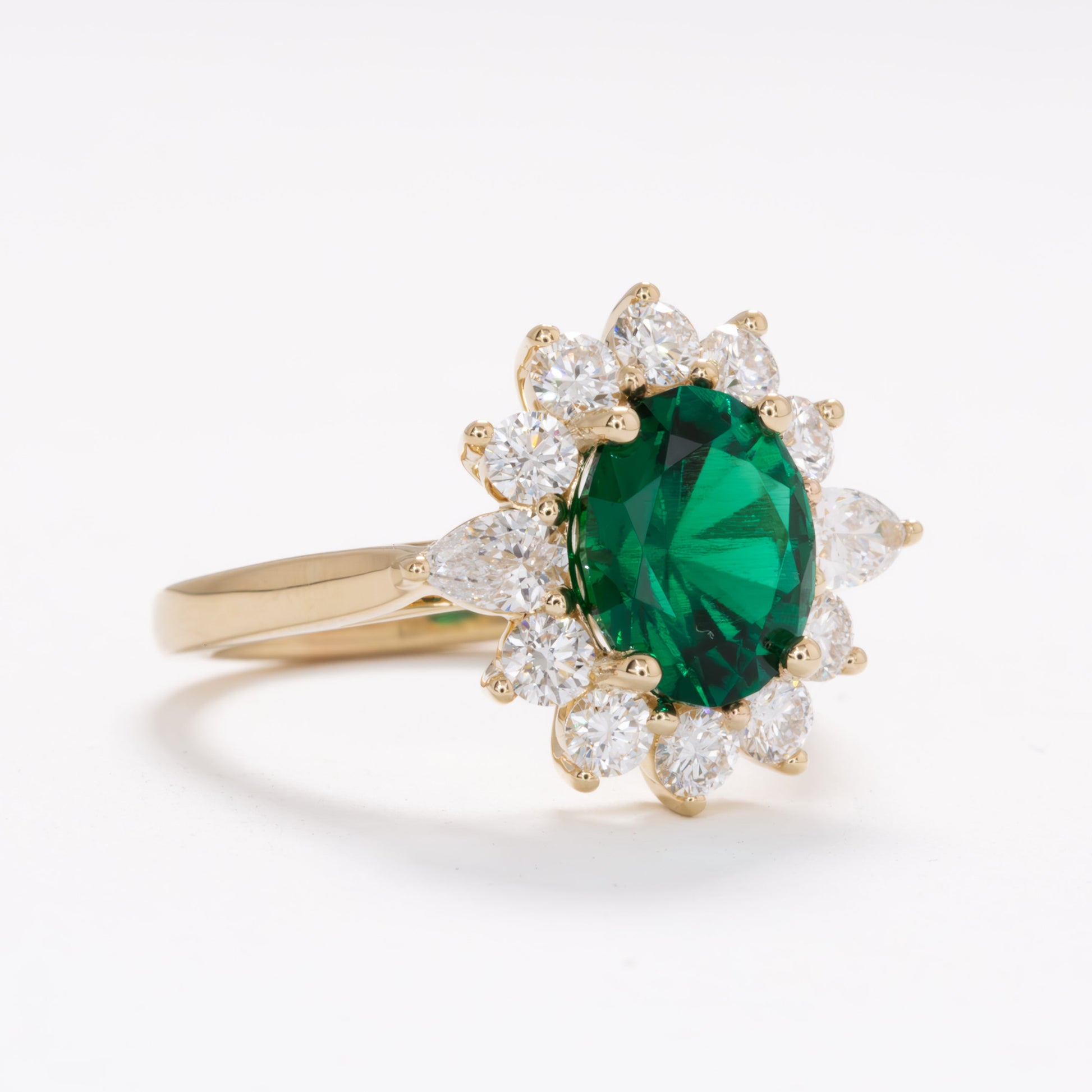 shani halo engagement ring wiht oval lab emerald