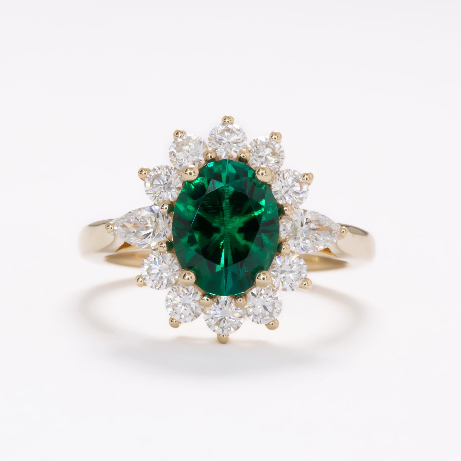 shani halo engagement ring wiht oval lab emerald