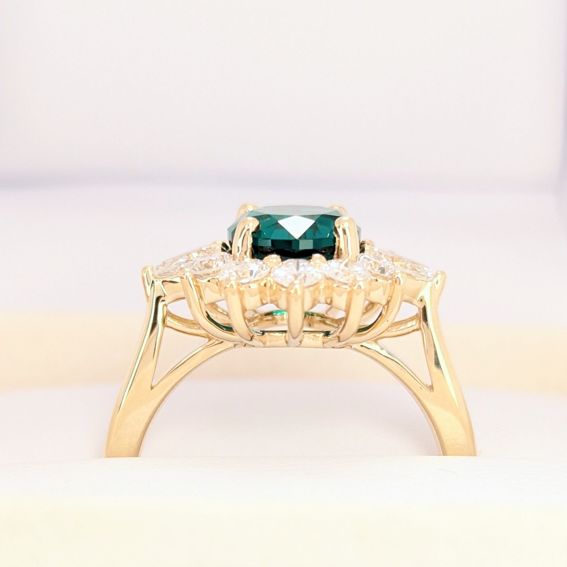 shani halo engagement ring wiht oval lab emerald