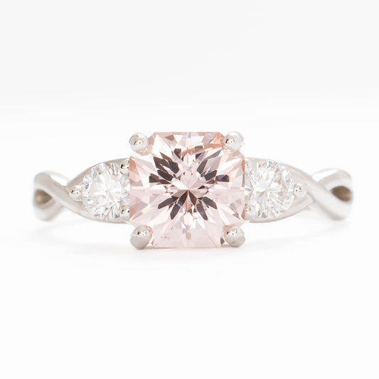 shasta three stone ring in silver with peach lab sapphire asscher