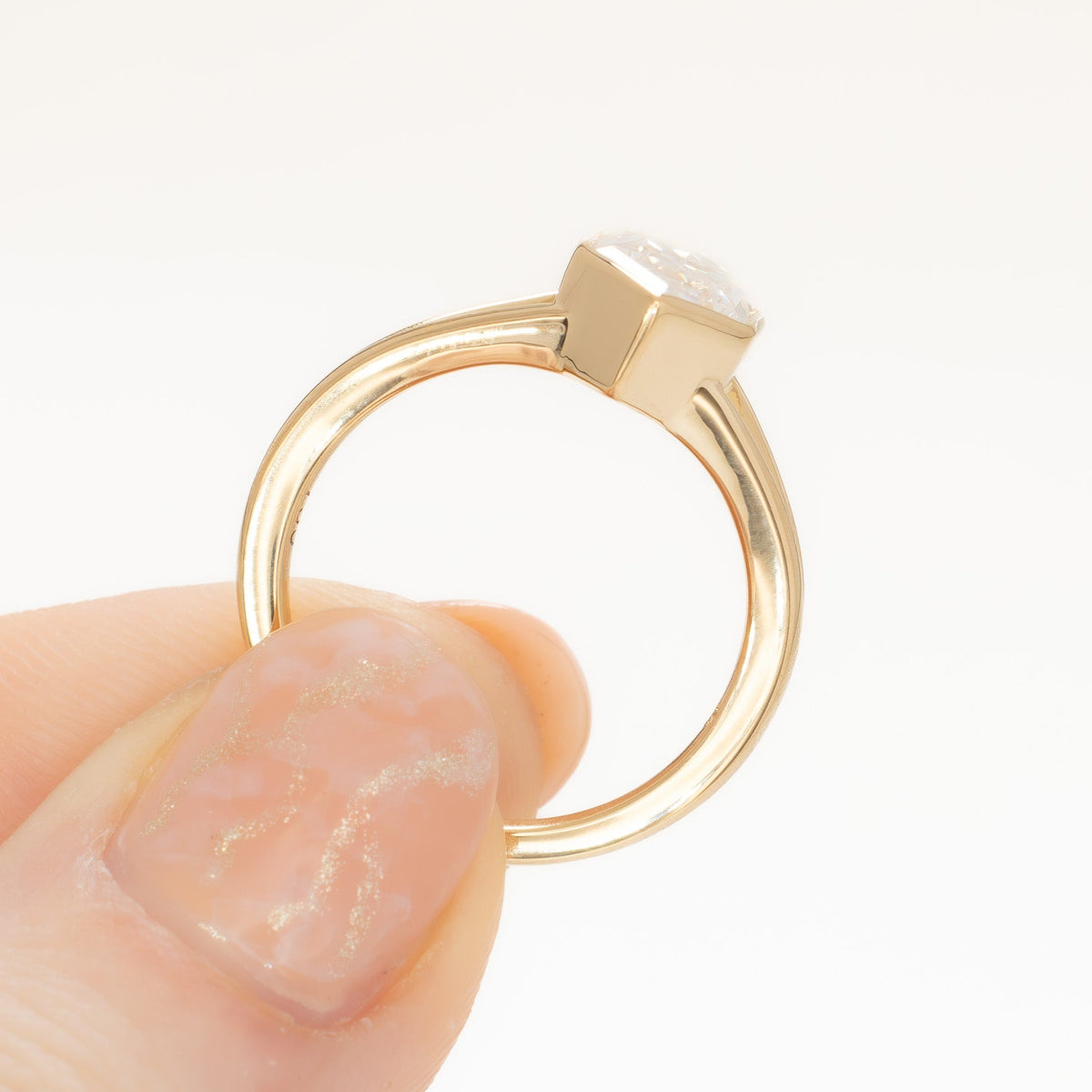shion solitaire split shank ring in yellow gold with dutch marquise moissanite
