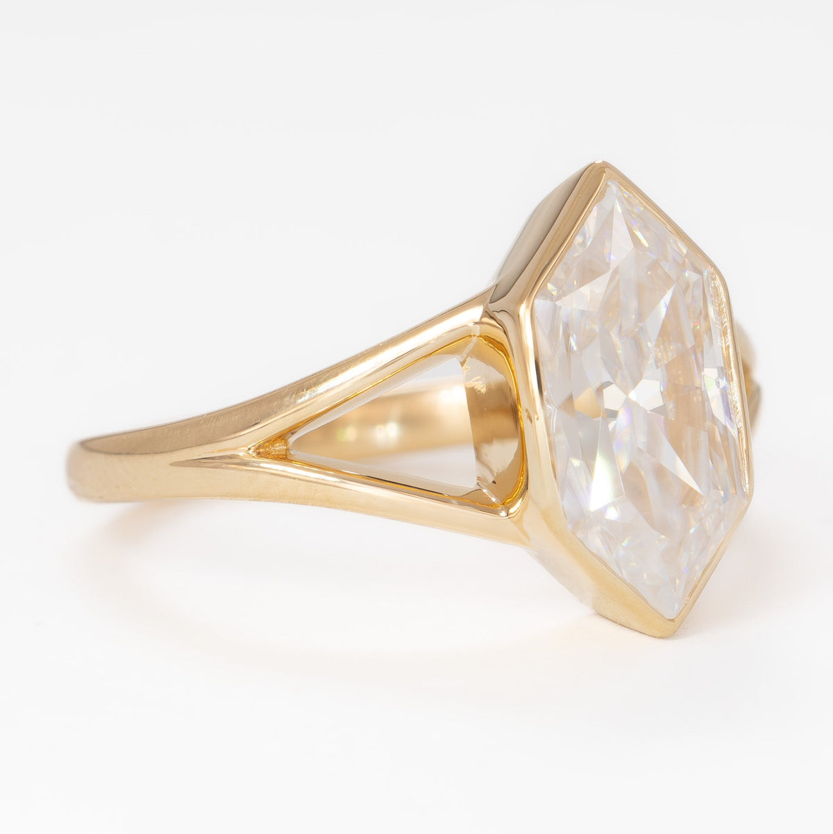 shion solitaire split shank ring in yellow gold with dutch marquise moissanite