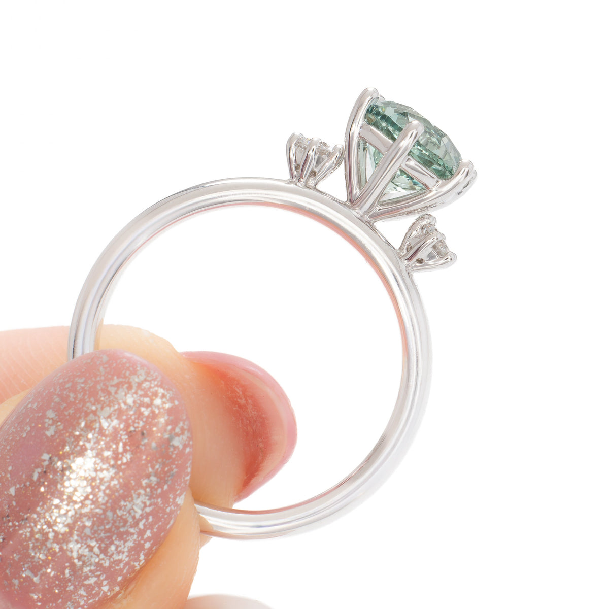 signy three stone ring in white gold with round green lab sapphire