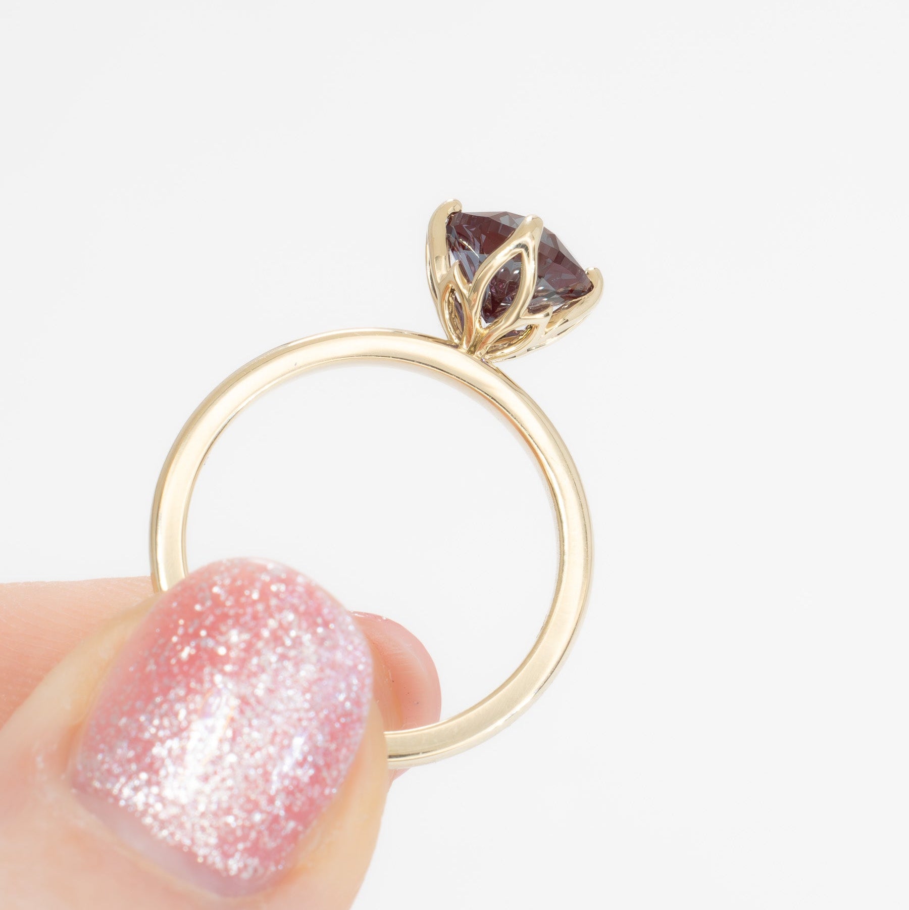 stasa solitaire engagement ring with round lab alexandrite in yellow gold