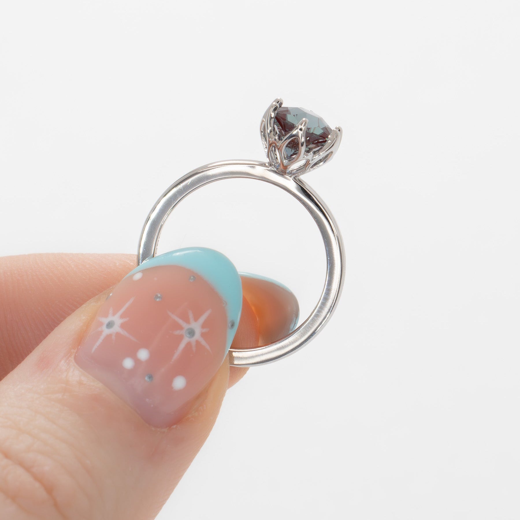 stasa solitaire engagement ring with tulip basket and hex lab alexandrite