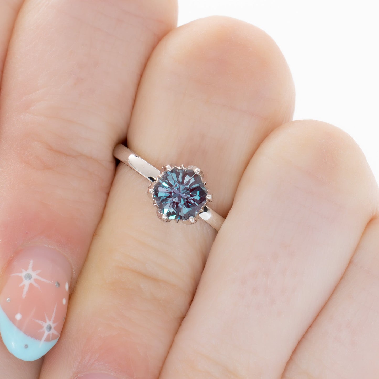 stasa solitaire engagement ring with tulip basket and hex lab alexandrite