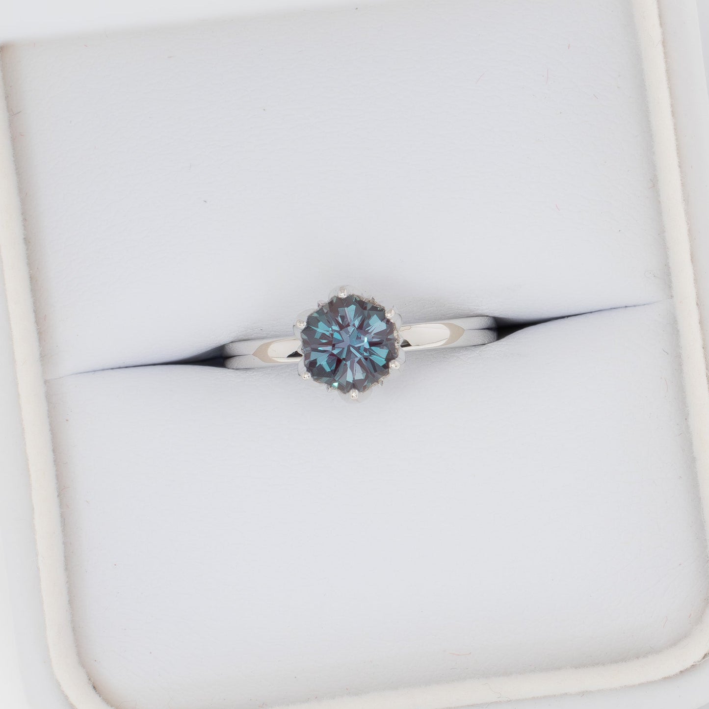 stasa solitaire engagement ring with tulip basket and hex lab alexandrite
