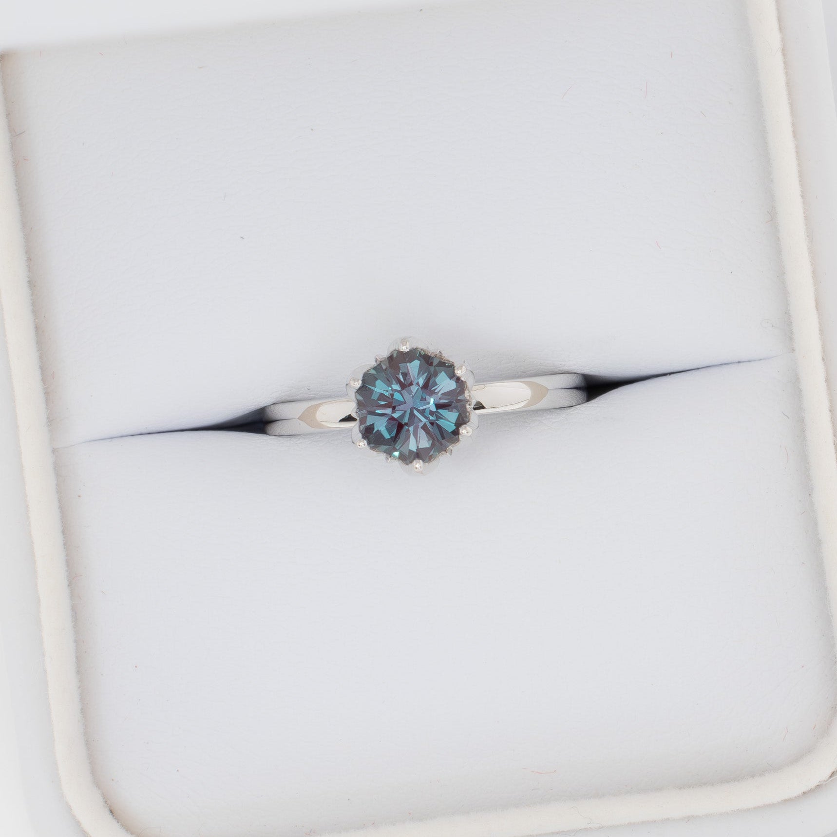 stasa solitaire engagement ring with tulip basket and hex lab alexandrite