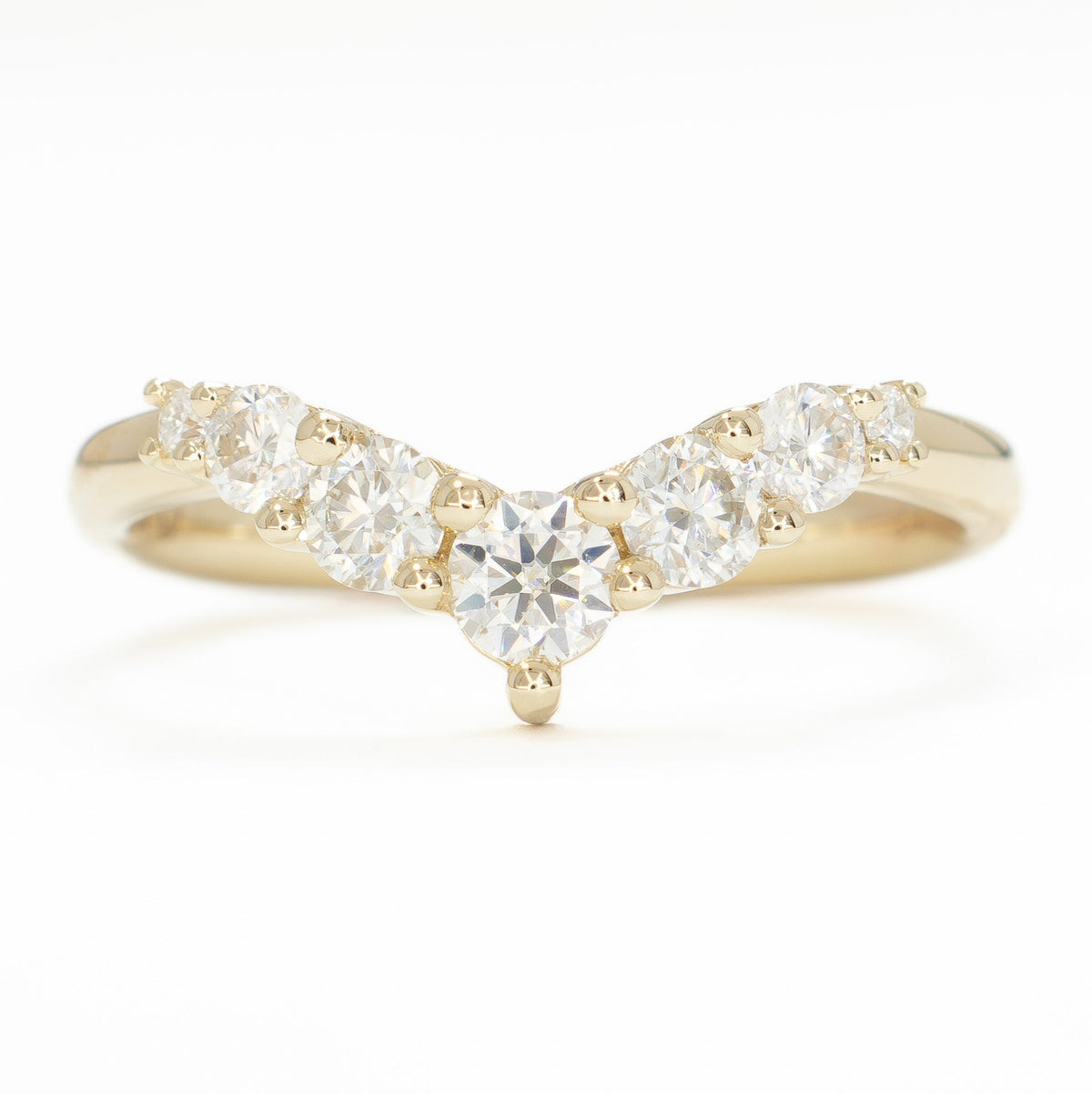stella contour band in yellow gold with moissanite accents