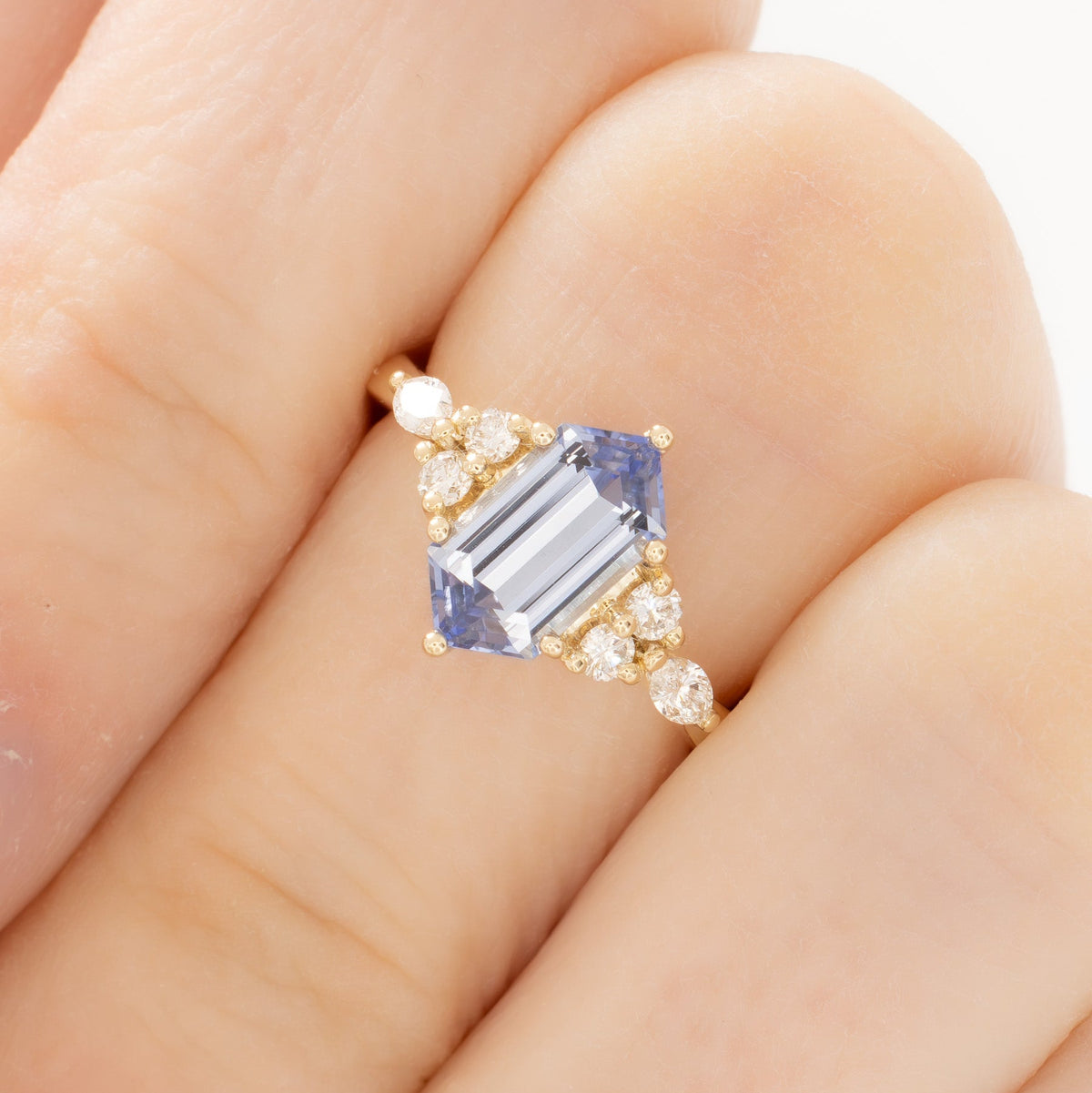 summer accented ring in yellow gold with light blue lab sapphire dutch marquise
