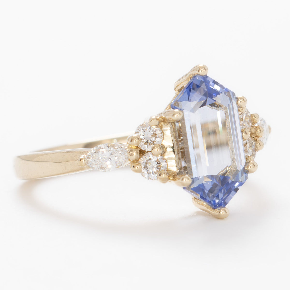 summer accented ring in yellow gold with light blue lab sapphire dutch marquise