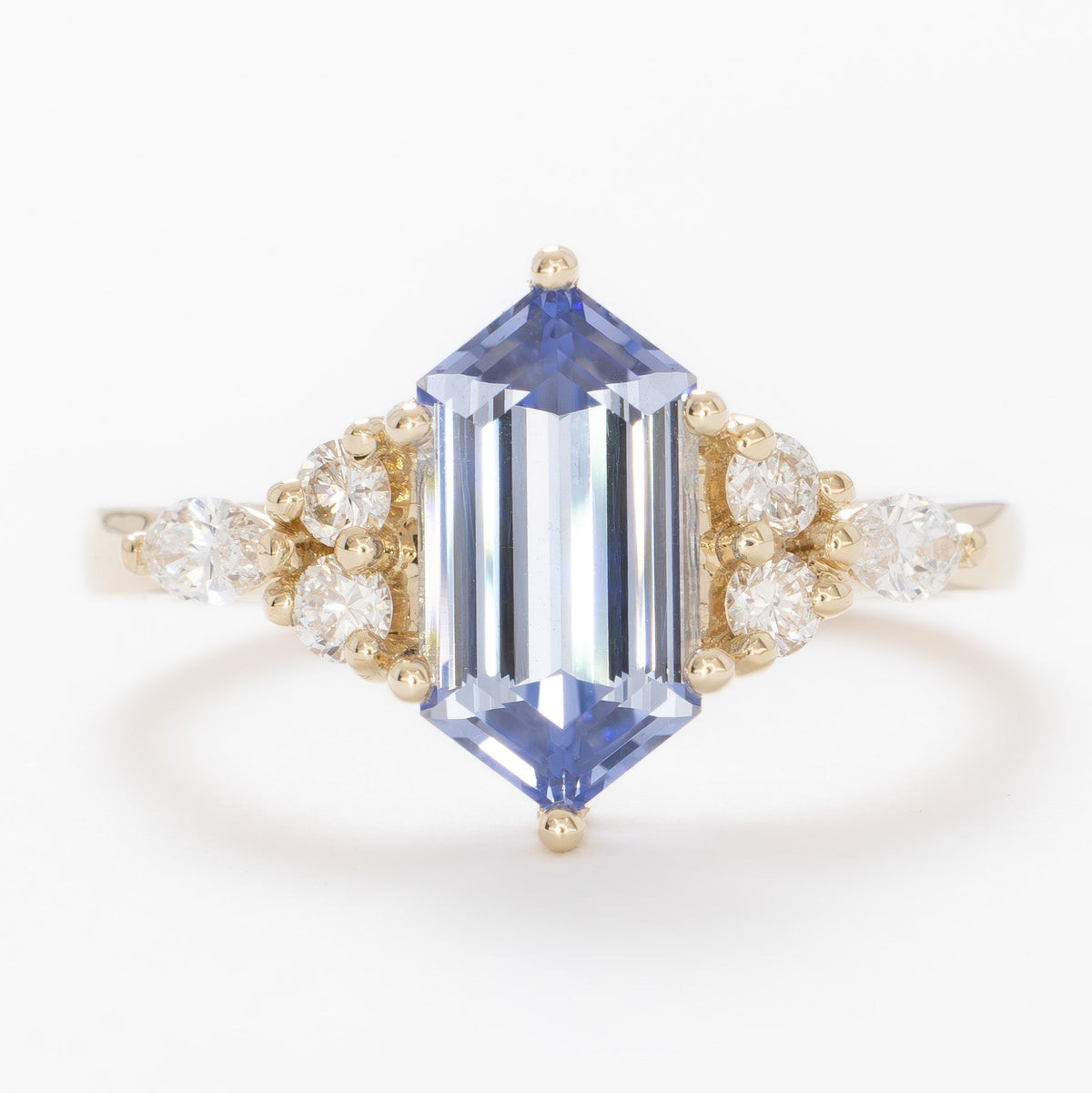 summer accented ring in yellow gold with light blue lab sapphire dutch marquise