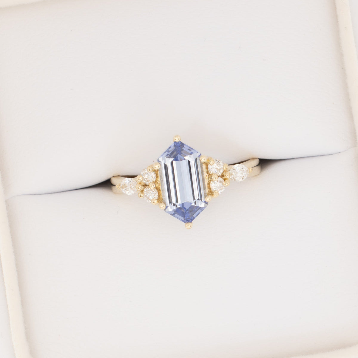 summer accented ring in yellow gold with light blue lab sapphire dutch marquise