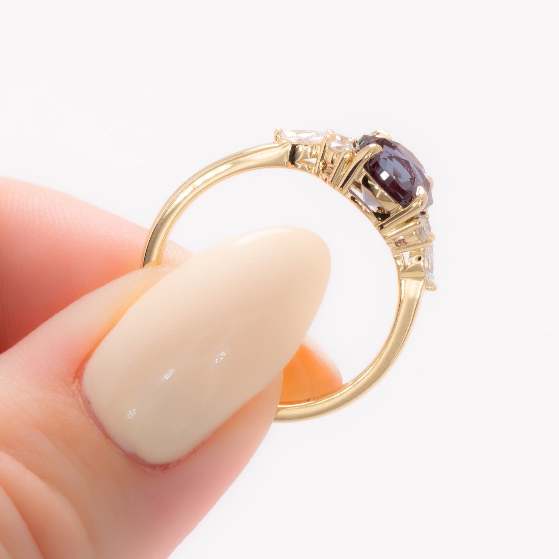 summer engagement ring in yellow gold with round lab alexandrite