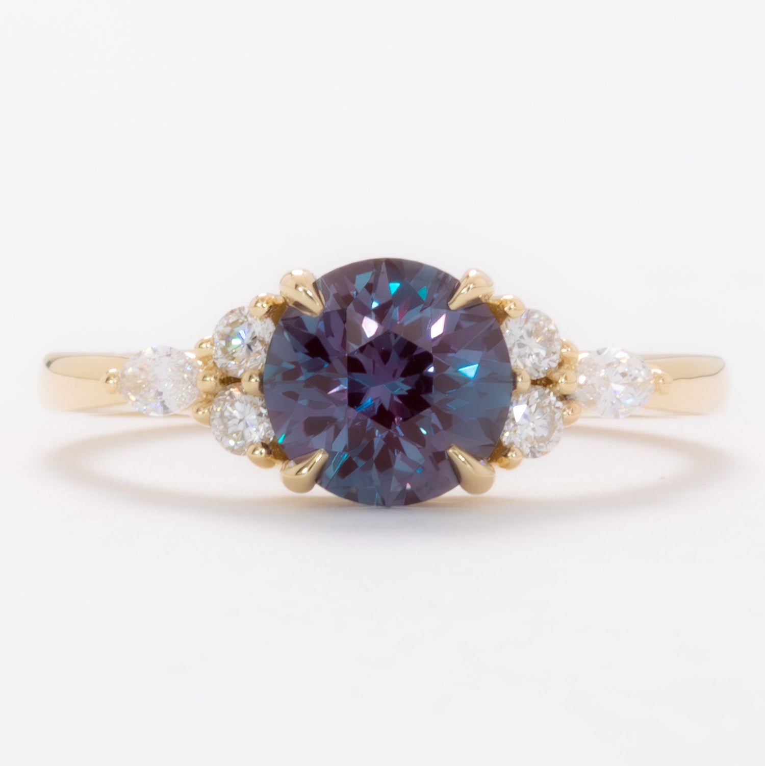 summer engagement ring in yellow gold with round lab alexandrite