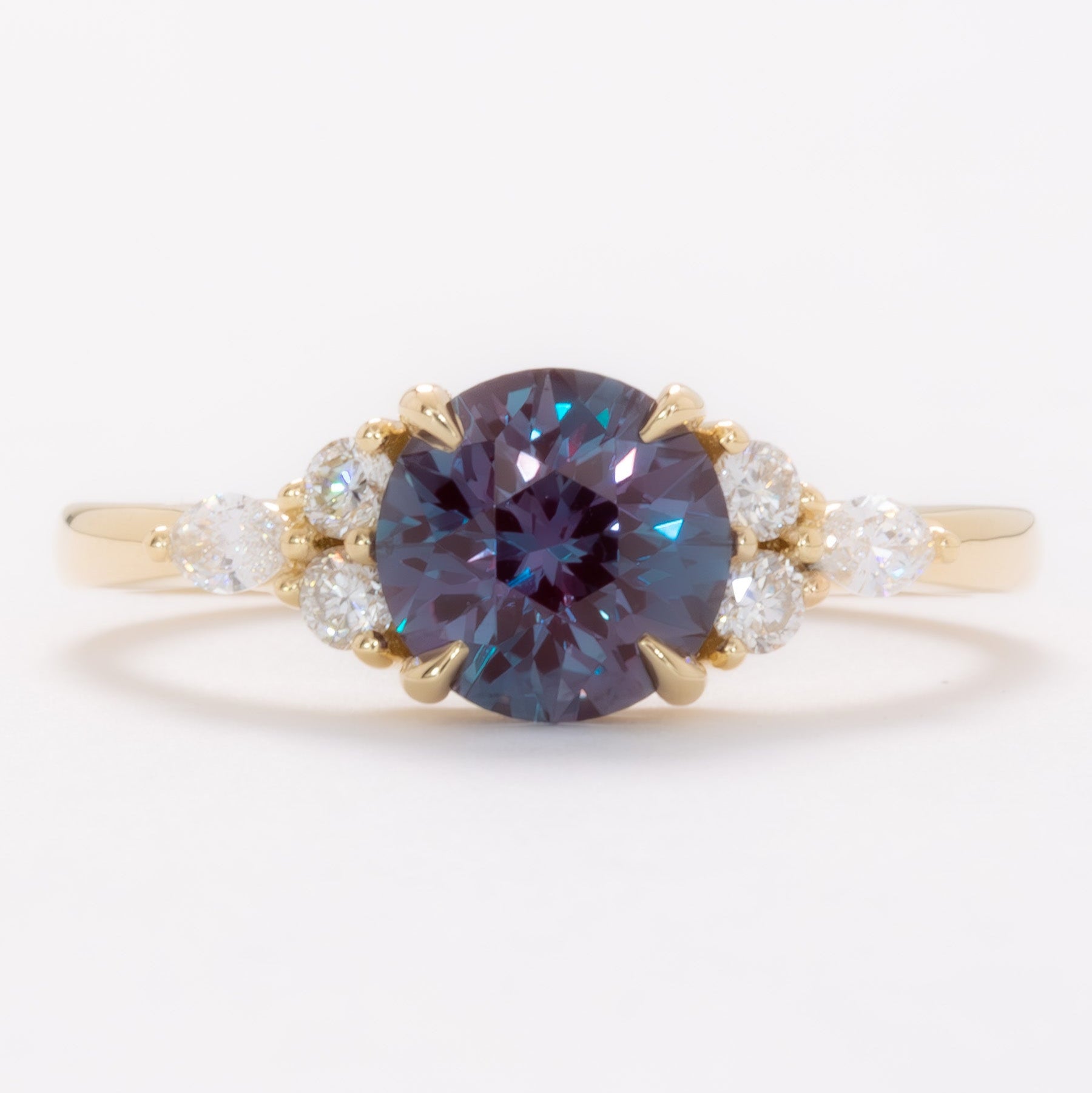 summer engagement ring in yellow gold with round lab alexandrite