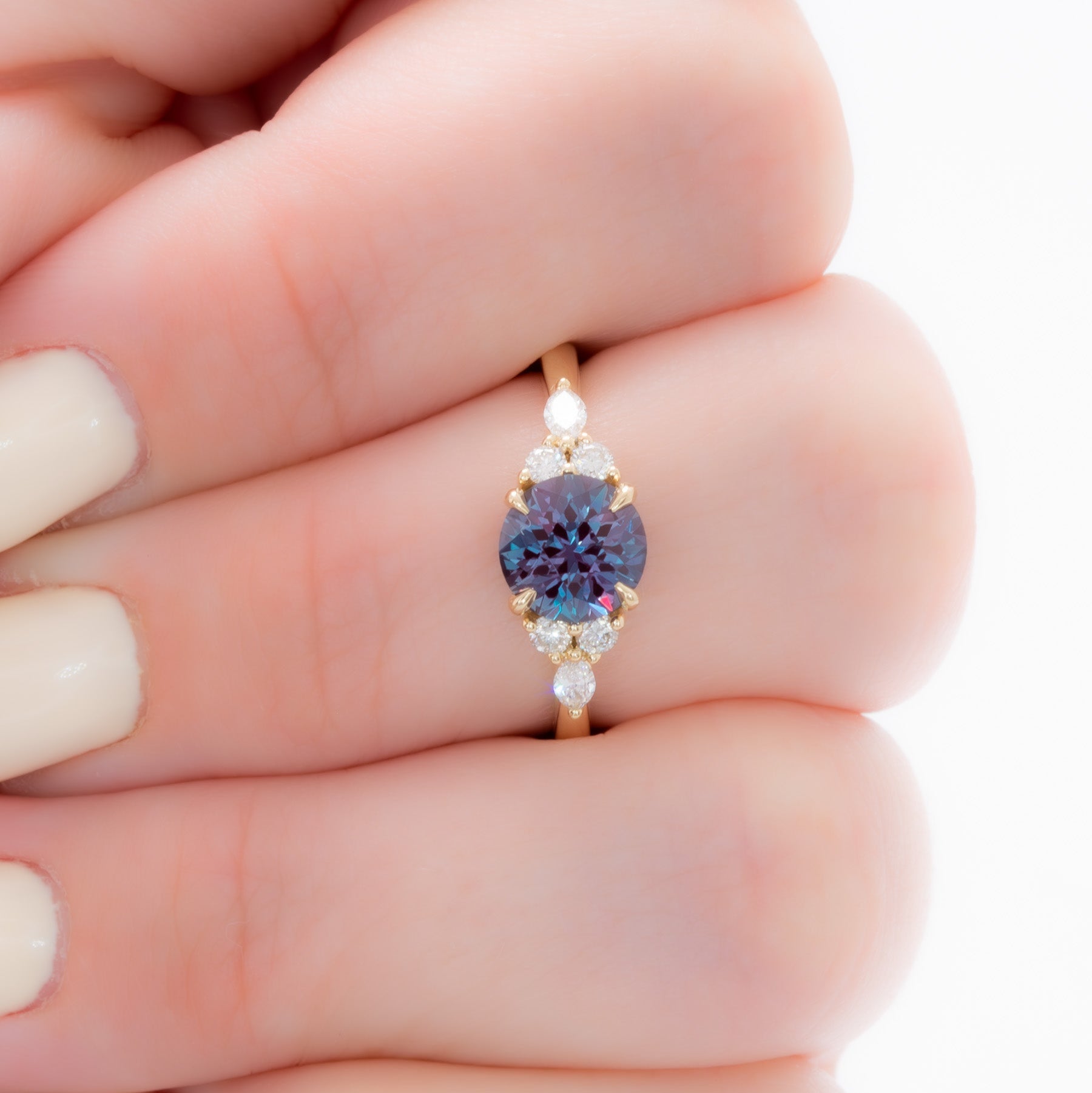 summer engagement ring in yellow gold with round lab alexandrite