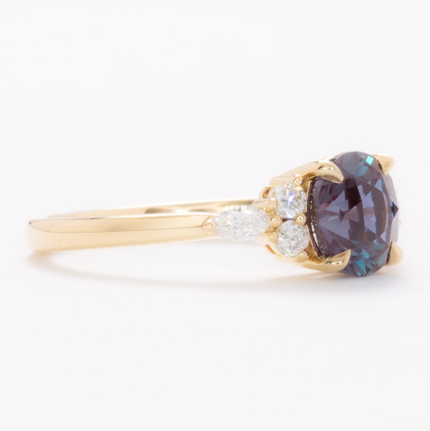 summer engagement ring in yellow gold with round lab alexandrite