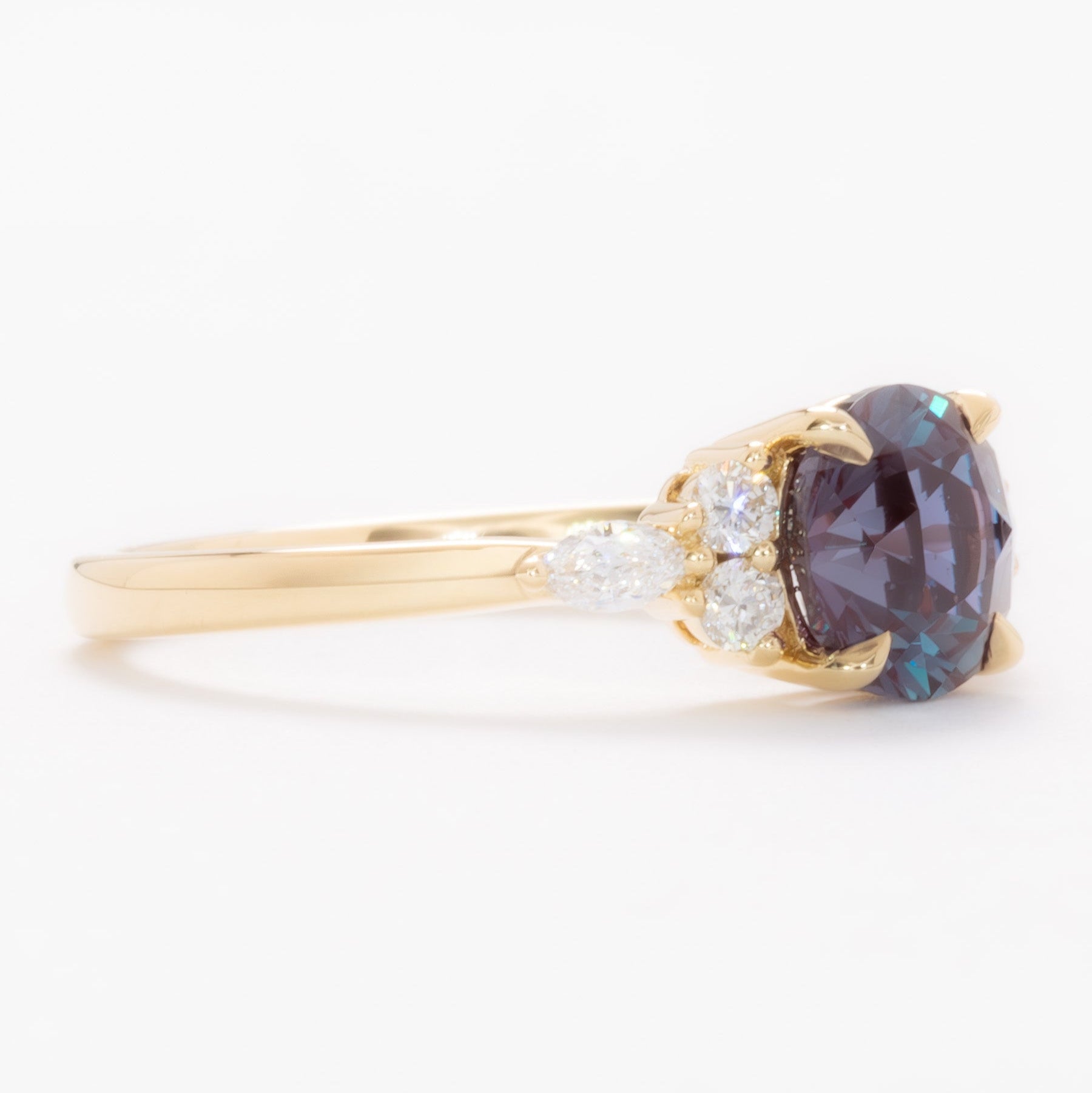 summer engagement ring in yellow gold with round lab alexandrite
