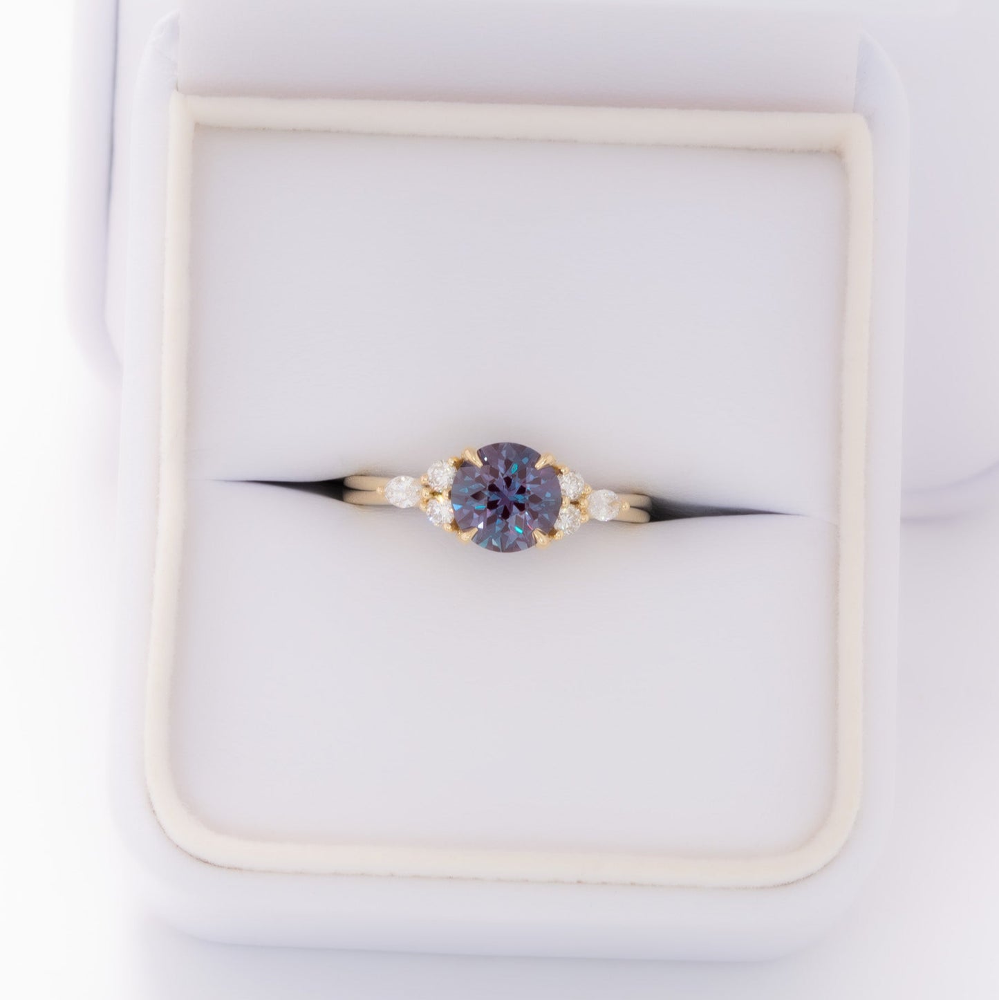 summer engagement ring in yellow gold with round lab alexandrite