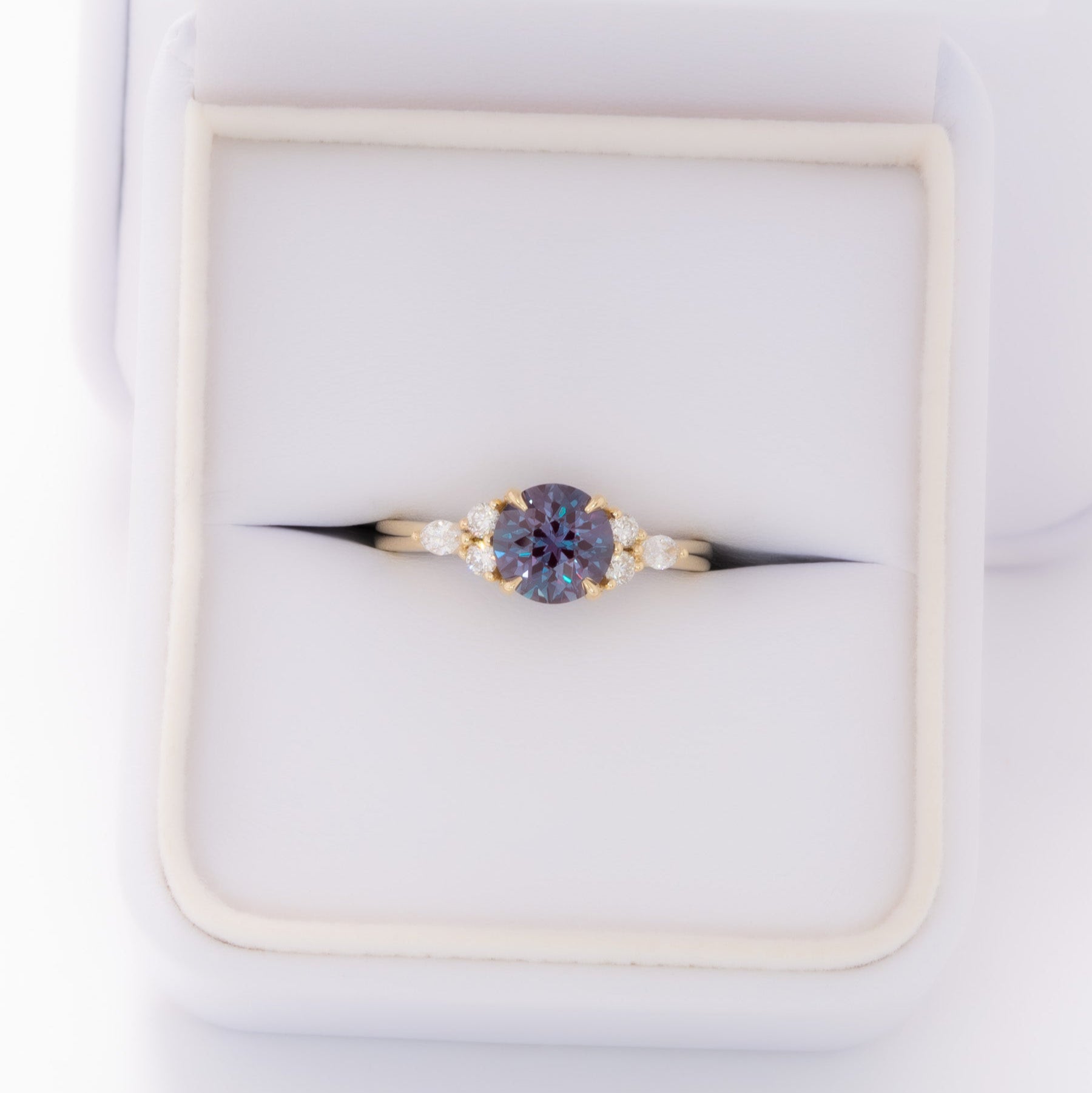 summer engagement ring in yellow gold with round lab alexandrite