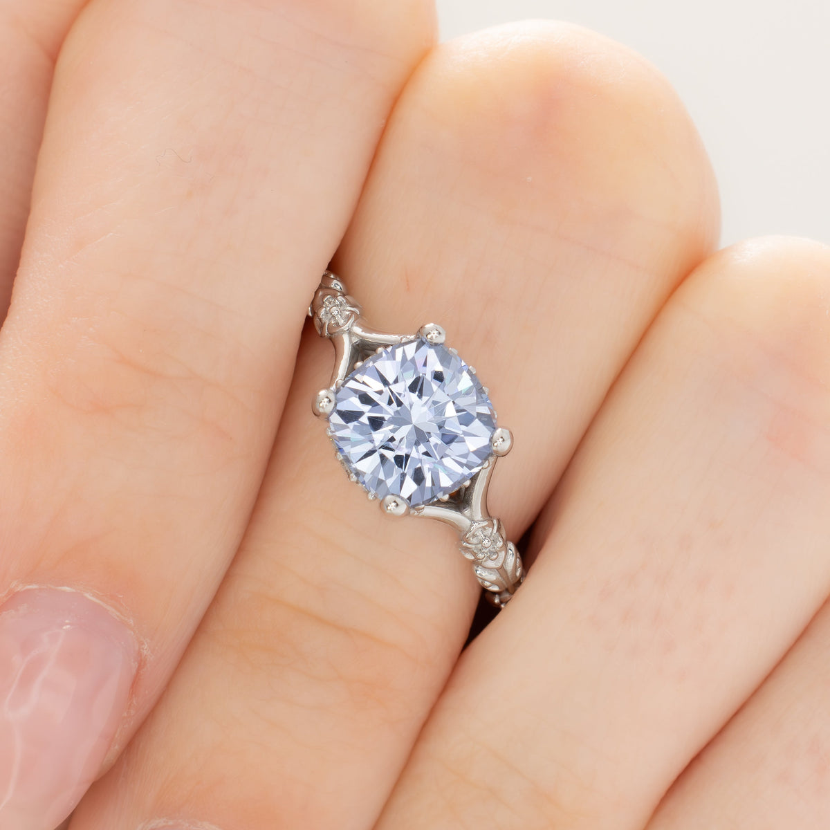 sylvie nature inspired ring in white gold with arctic blue lab sapphire nova cushion