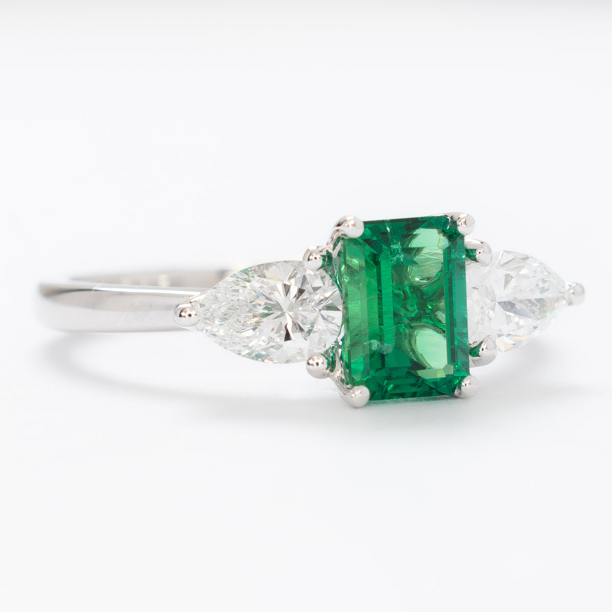tawnee three stone ring in white gold with step cut lab emerald