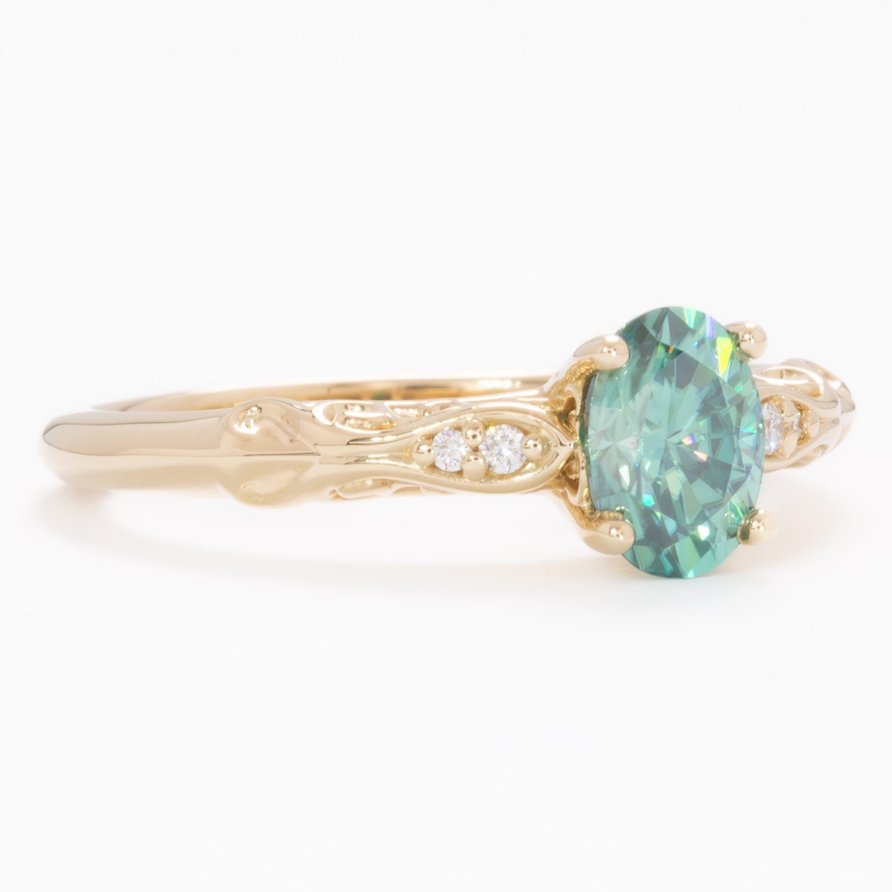victoria engagement ring with oval green moissanite