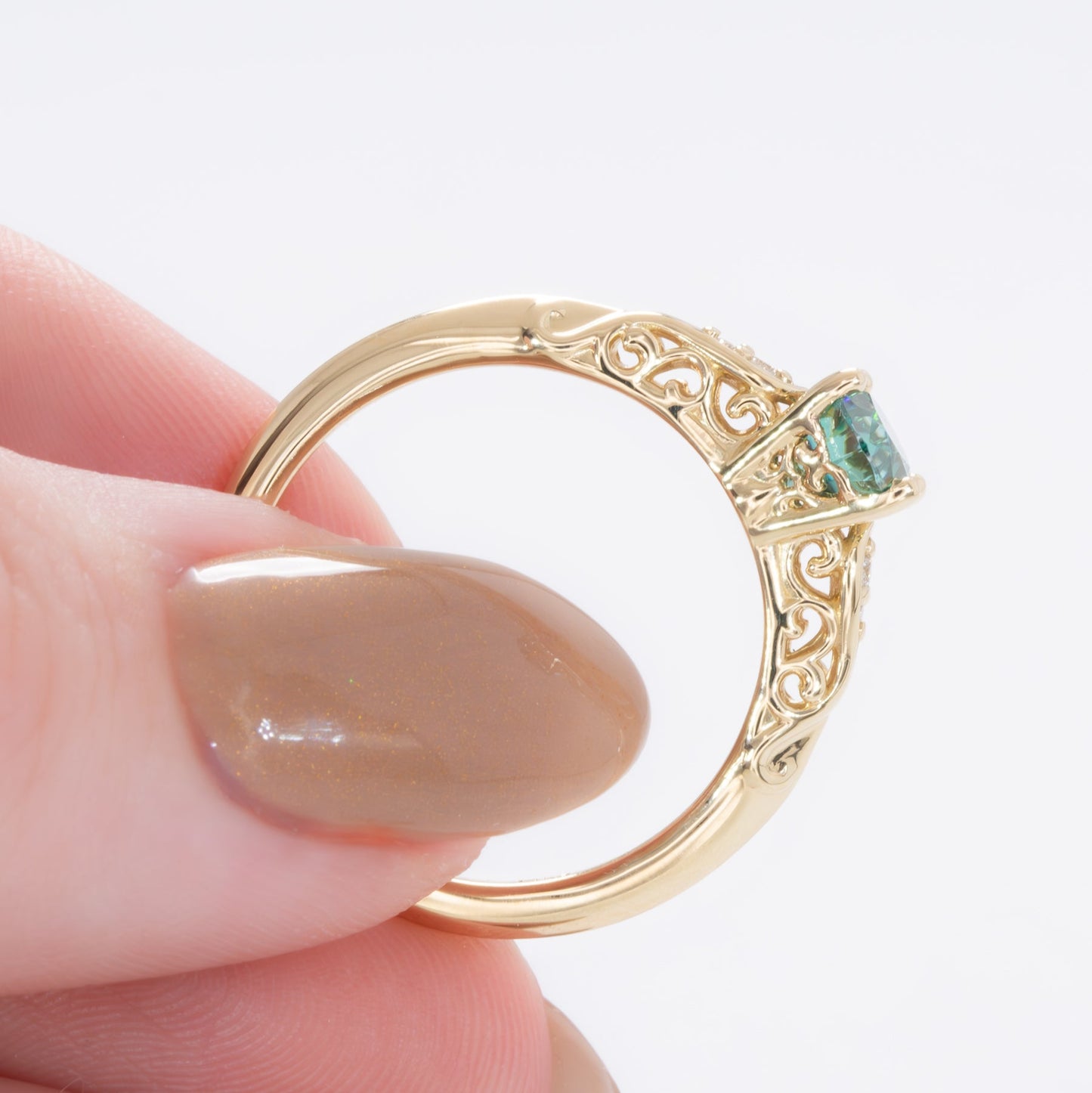 victoria ring with oval green moissanite