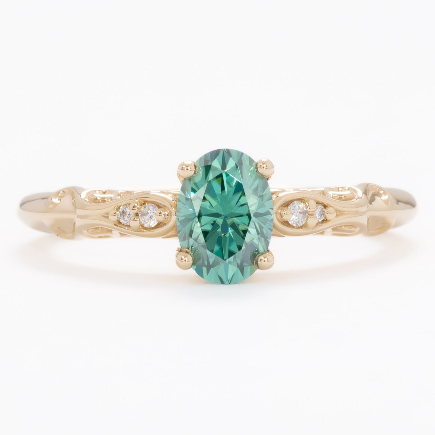 victoria engagement ring with oval green moissanite