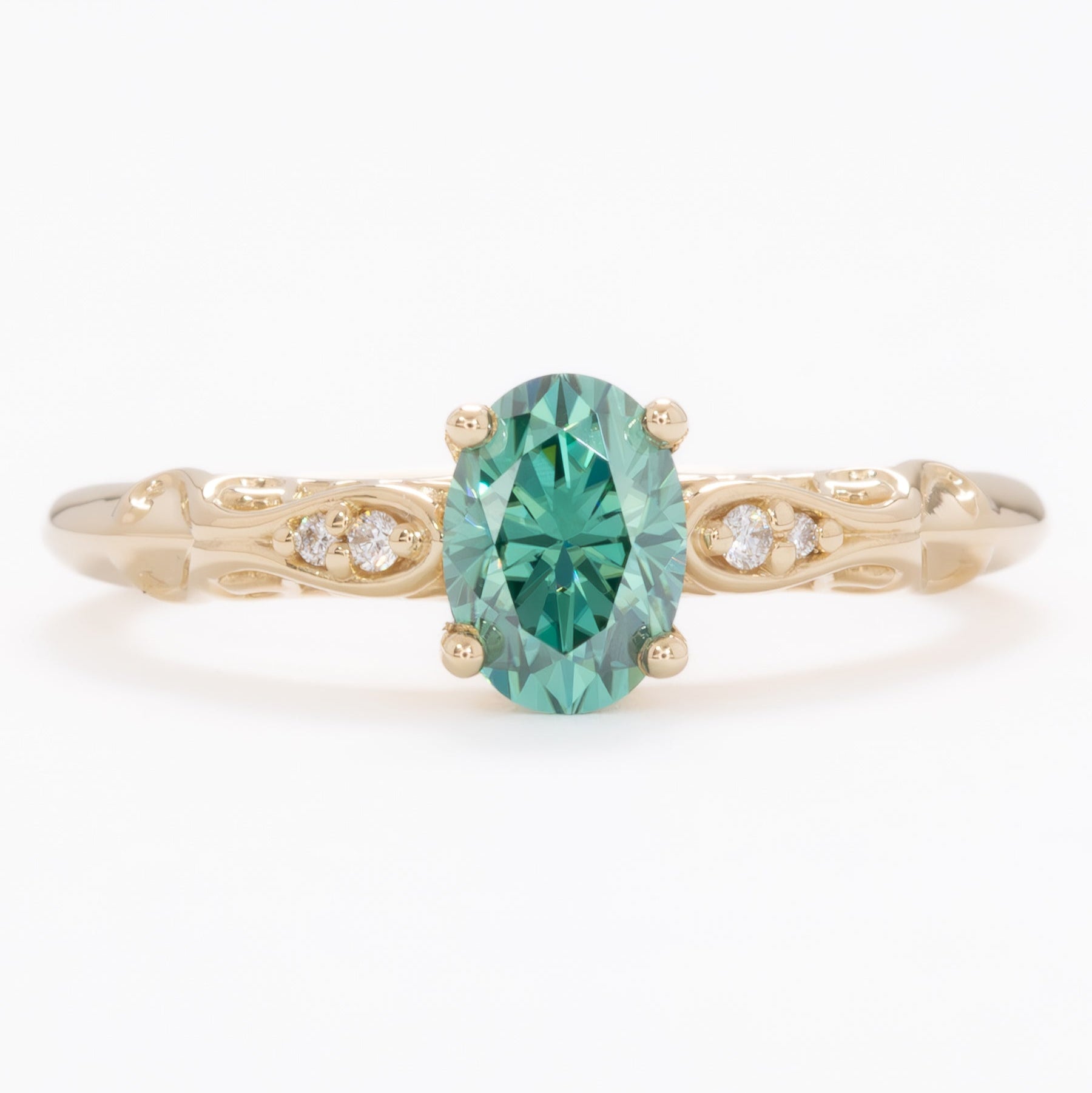victoria engagement ring with oval green moissanite