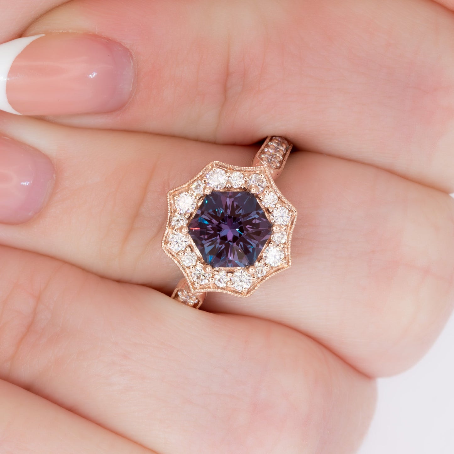 violet art deco halo engagement ring in rose gold with hex lab alexandrite