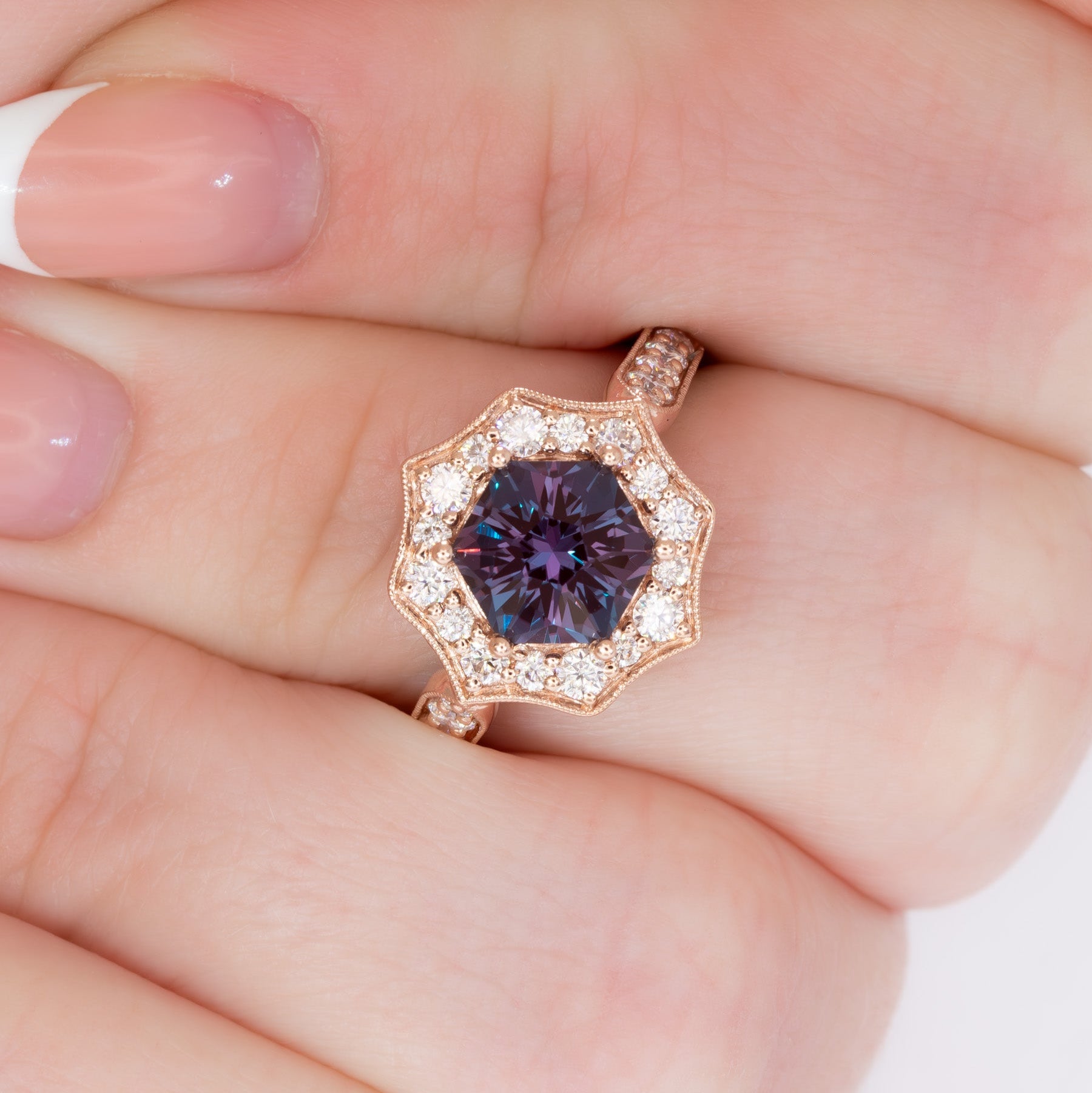 violet art deco halo engagement ring in rose gold with hex lab alexandrite