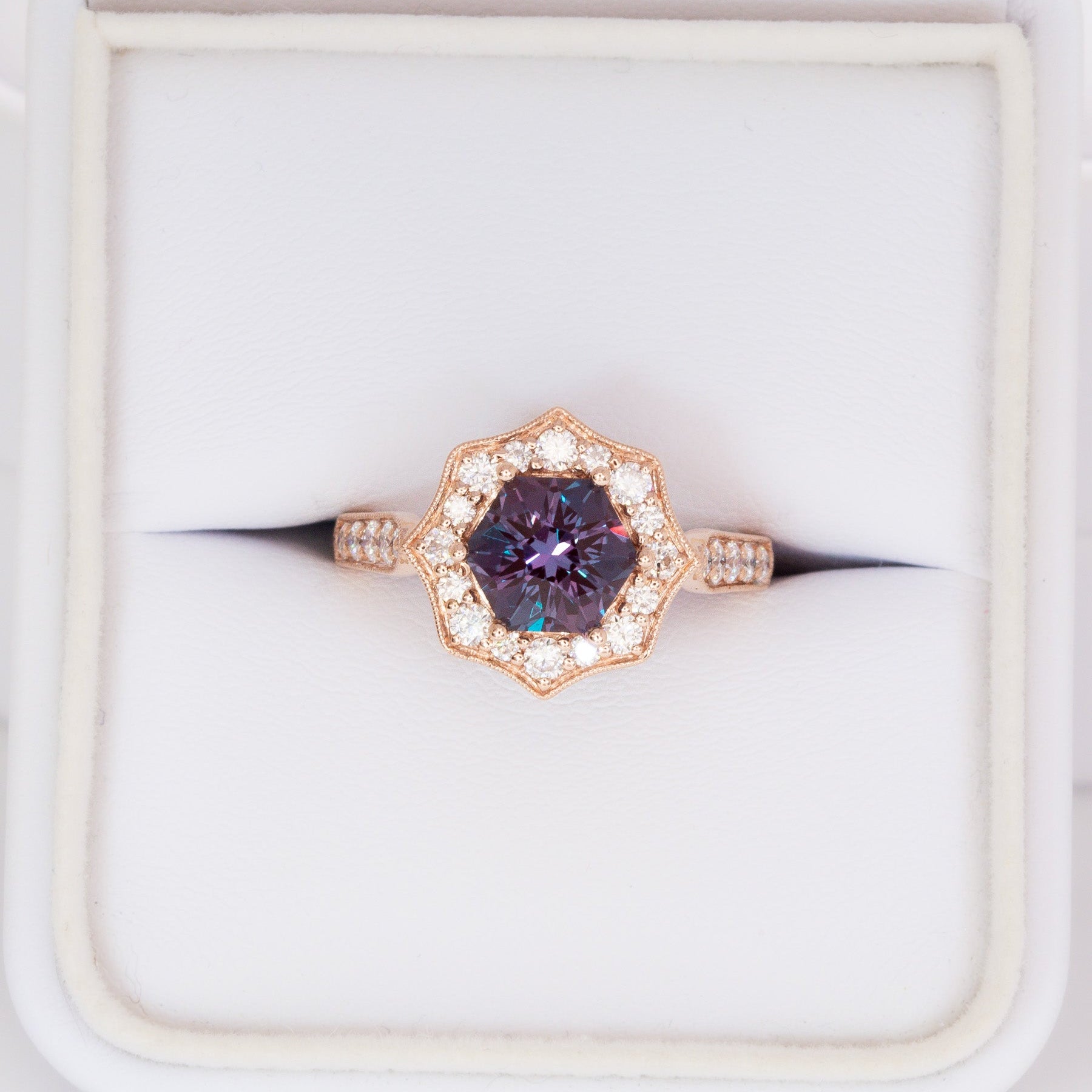 violet art deco halo engagement ring in rose gold with hex lab alexandrite