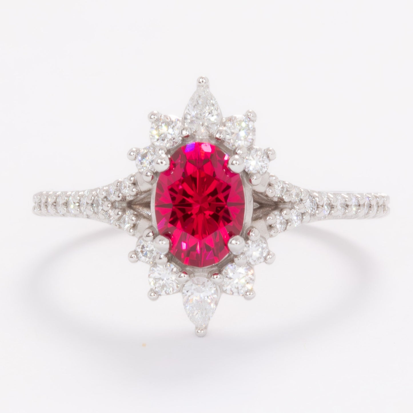 white gold luna engagement ring with oval lab ruby